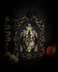 Unholy Hare — one-of-a-kind handmade gothic tracery frame with a real rabbit skull on snake skin, painted dove feet with gilded claws, a gold cross with pentagram and serpent, and a ring of marten fur
