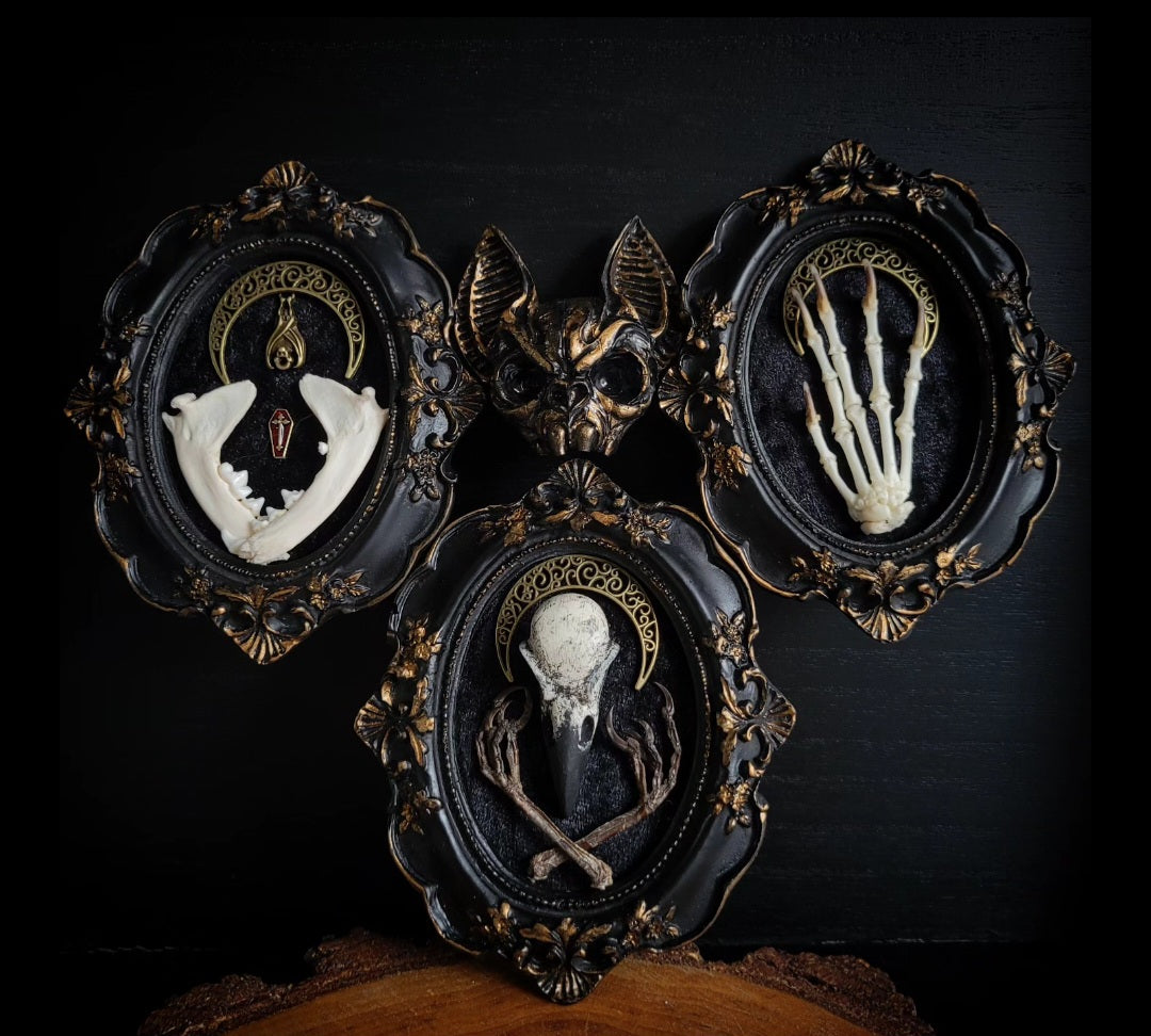 Triptych — handmade gothic triptych shadowbox, made to order. Set of 3 conjoined ornate gothic frames with real bones, skulls and decorative elements, fully hand-assembled. Dark collectible wall decor commission by Morbid Oddities.