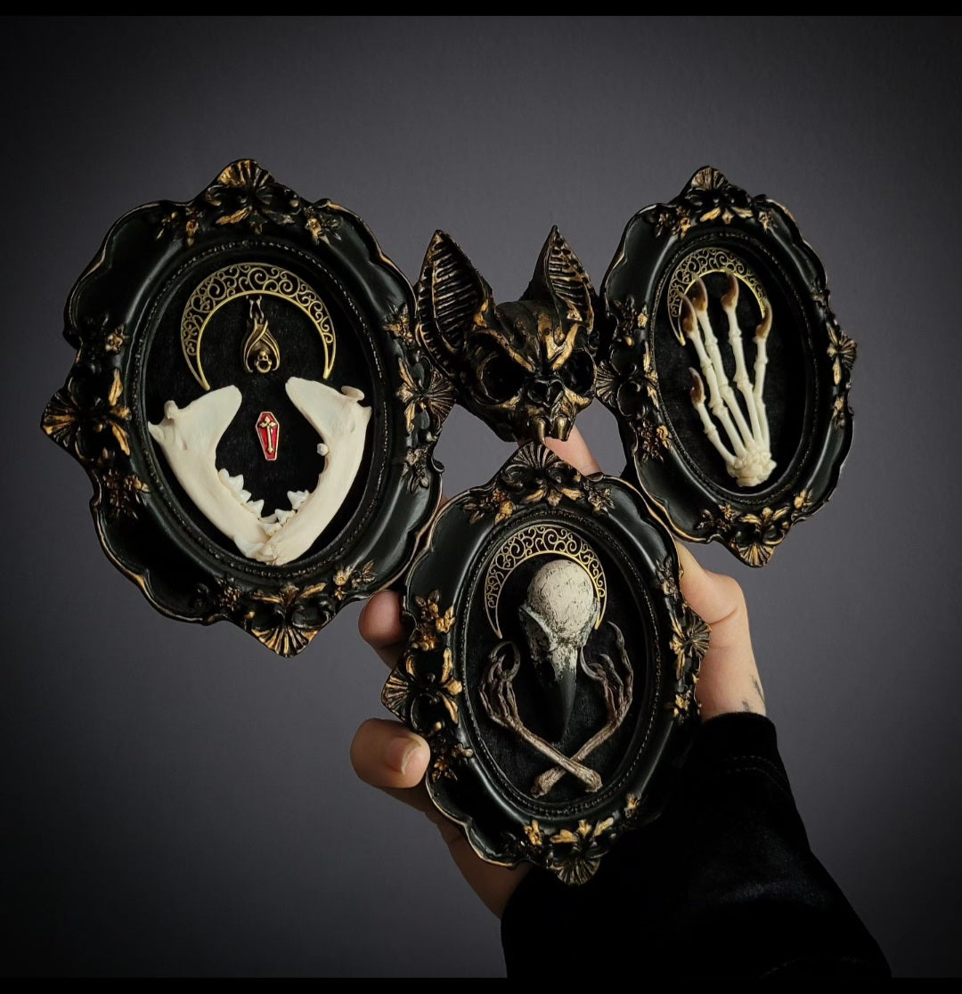 Triptych — handmade gothic triptych shadowbox, made to order. Set of 3 conjoined ornate gothic frames with real bones, skulls and decorative elements, fully hand-assembled. Dark collectible wall decor commission by Morbid Oddities.
