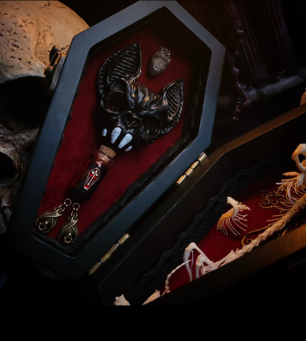 Count Mousula | Vampires — handmade gothic coffin display with preserved mouse skeleton, mummified heart, small skulls and bones on deep red velvet interior with lace ornaments, hinged lid, 15.5x9cm