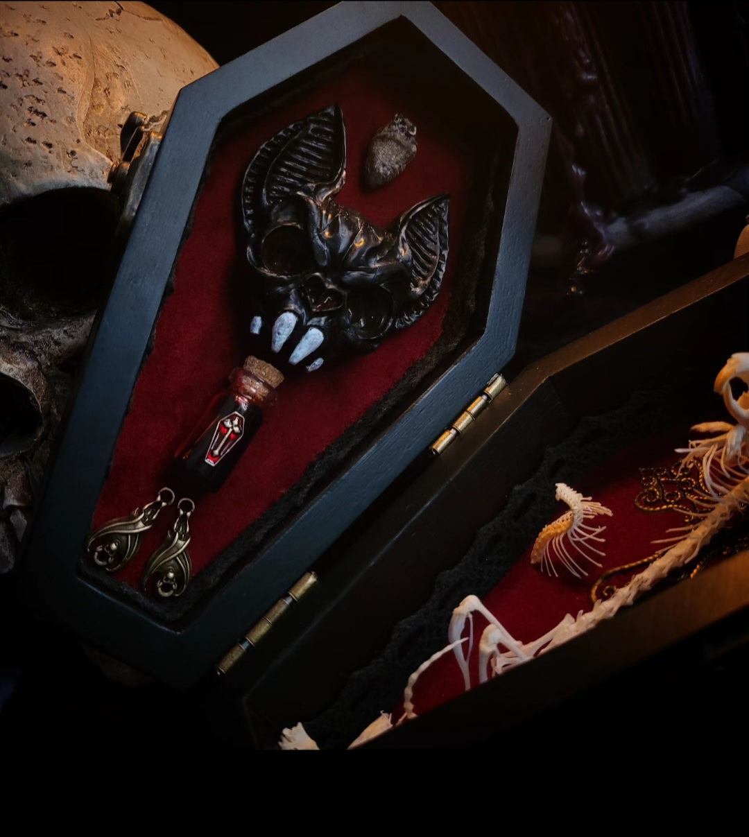 Count Mousula | Vampires — handmade gothic coffin display with preserved mouse skeleton, mummified heart, small skulls and bones on deep red velvet interior with lace ornaments, hinged lid, 15.5x9cm