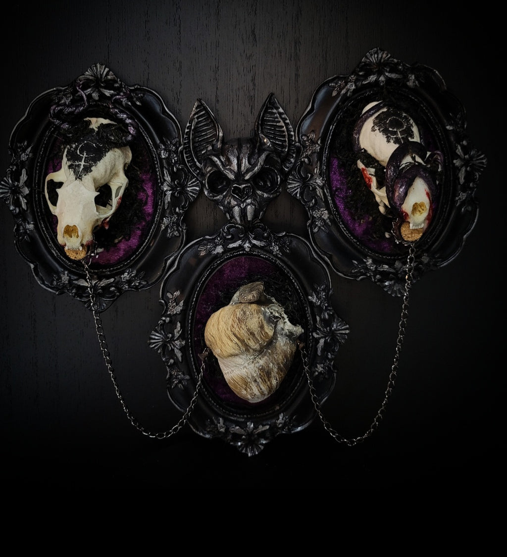 Triptych — handmade gothic triptych shadowbox, made to order. Set of 3 conjoined ornate gothic frames with real bones, skulls and decorative elements, fully hand-assembled. Dark collectible wall decor commission by Morbid Oddities.
