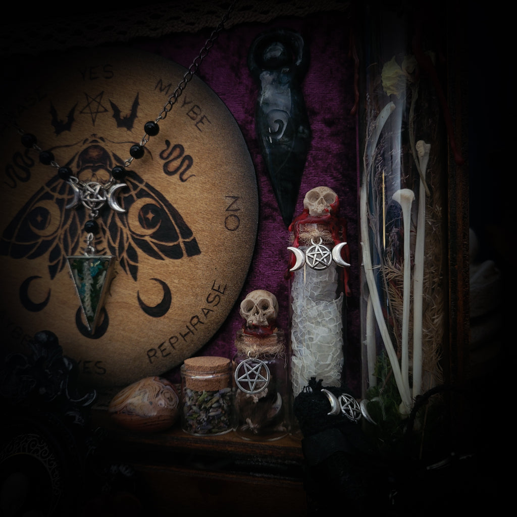 Universal Witch Altar Box — handmade witch altar box, made to order. Custom portable ritual space with pendulum board, obsidian scrying mirror, spell jars, wand, crystals, bones and symbolic elements. Dark witchcraft commission by Morbid Oddities.
