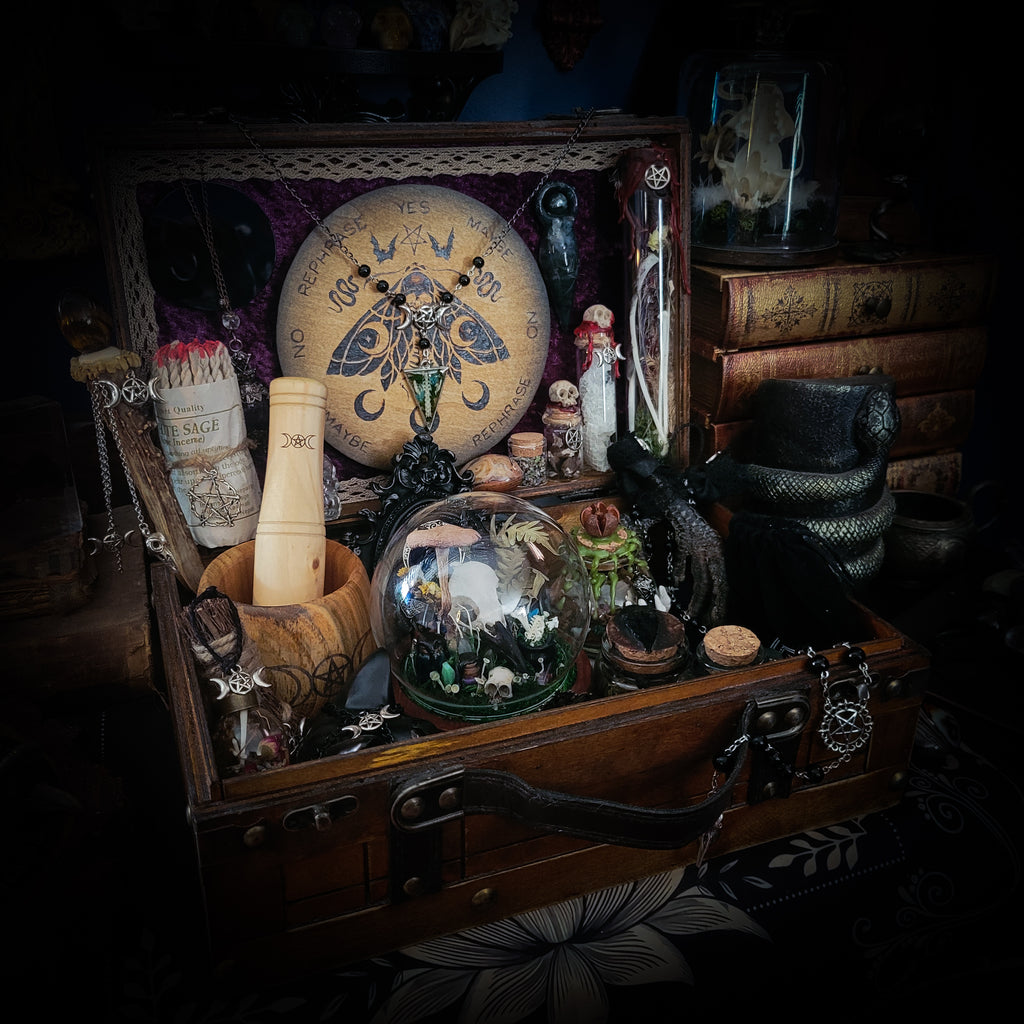 Universal Witch Altar Box — handmade witch altar box, made to order. Custom portable ritual space with pendulum board, obsidian scrying mirror, spell jars, wand, crystals, bones and symbolic elements. Dark witchcraft commission by Morbid Oddities.