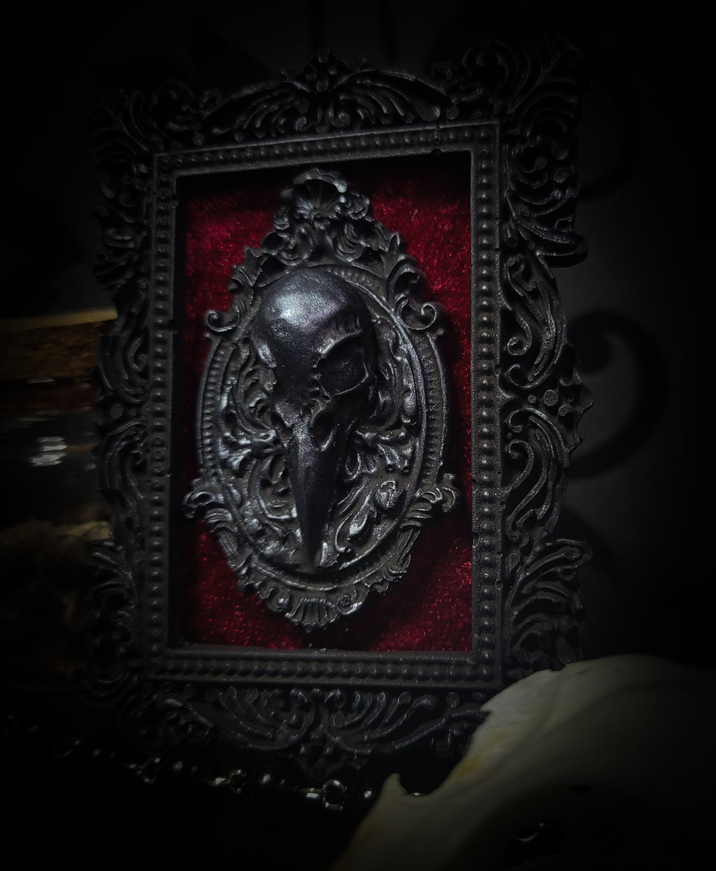 Corvusum Reliquary — handmade gothic shadowbox, made to order. Detailed handcrafted raven in ornate gothic frame on velvet background. Dark macabre wall and altar decor, 10x7.5cm.
