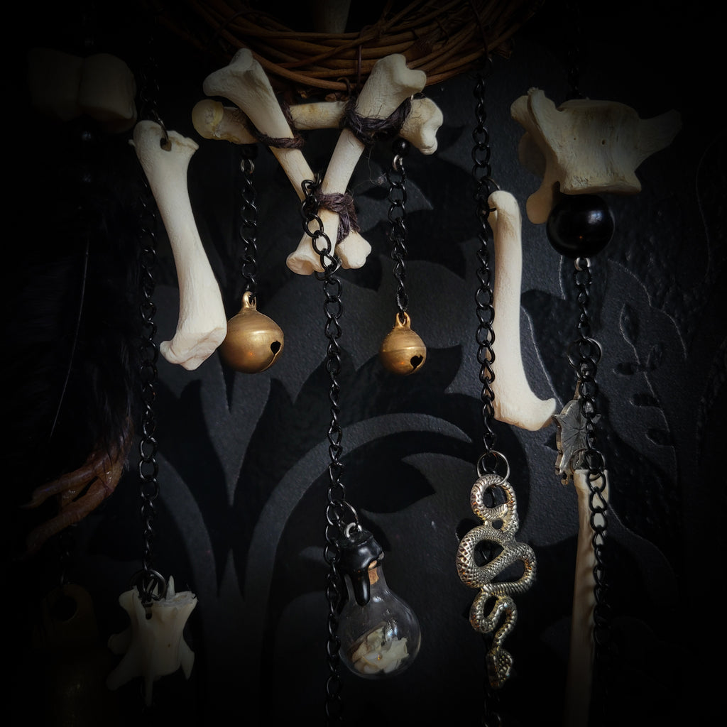 Witch Bell — handmade protective witch bells, made to order. Unique ritual charm with metal bells, bones and symbolic elements, designed for doorways, altars and ritual spaces. Handcrafted occult decor by Morbid Oddities