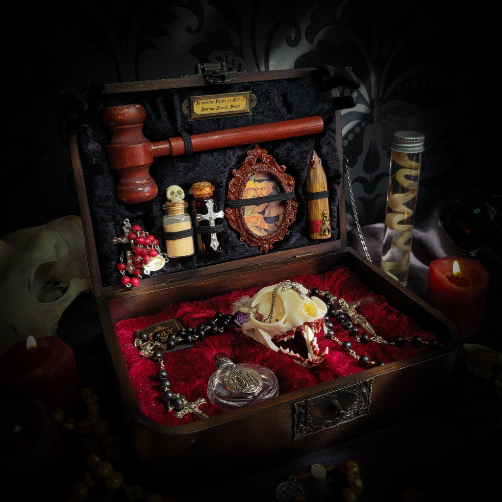 Vampire Hunter Kit — handmade gothic relic box, made to order. Hand-painted ornamented wooden suitcase with vampire stake, hammer, holy water, rosaries, crucifix, glass vials, miniature Bible and crimson velvet lining. Dark collectible decor, 23x17x9.5cm.