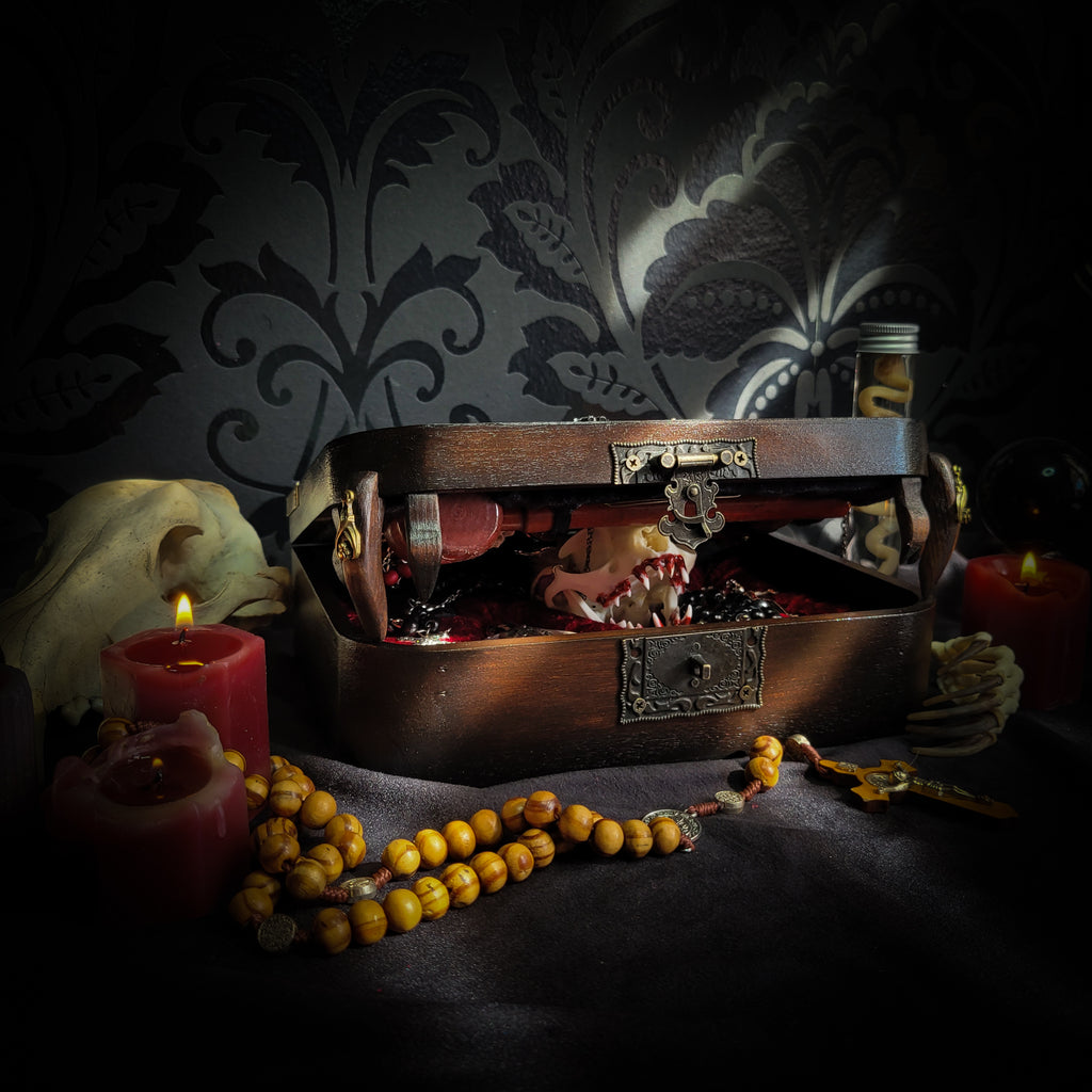 Vampire Hunter Kit — handmade gothic relic box, made to order. Hand-painted ornamented wooden suitcase with vampire stake, hammer, holy water, rosaries, crucifix, glass vials, miniature Bible and crimson velvet lining. Dark collectible decor, 23x17x9.5cm.
