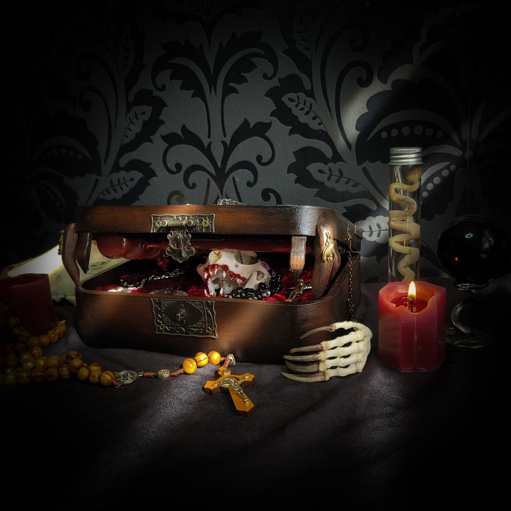 Vampire Hunter Kit — handmade gothic relic box, made to order. Hand-painted ornamented wooden suitcase with vampire stake, hammer, holy water, rosaries, crucifix, glass vials, miniature Bible and crimson velvet lining. Dark collectible decor, 23x17x9.5cm.