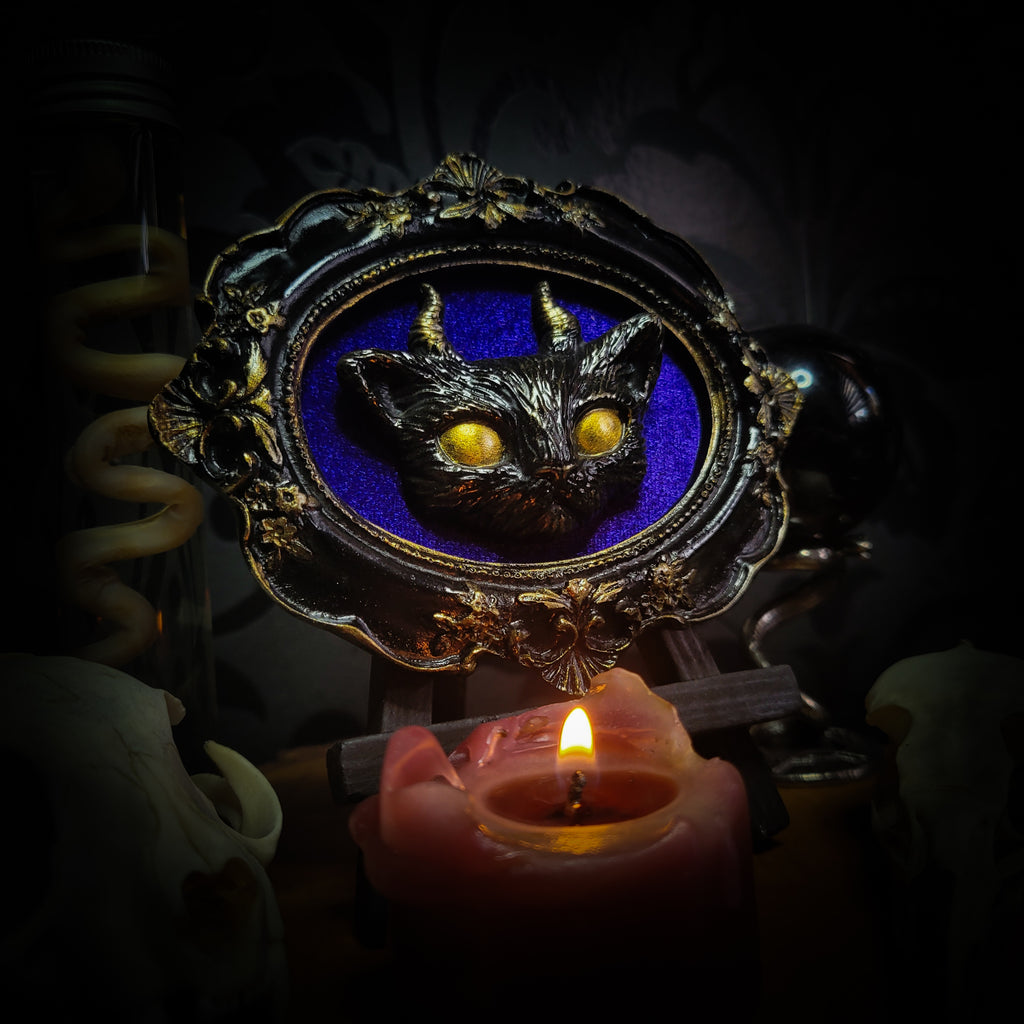 Felis Daemonium — handmade gothic shadowbox, made to order. Stylized cat head with horns, hand-cast and hand-painted, set on velvet background in ornate baroque frame. Occult wall decor, 12x10cm.