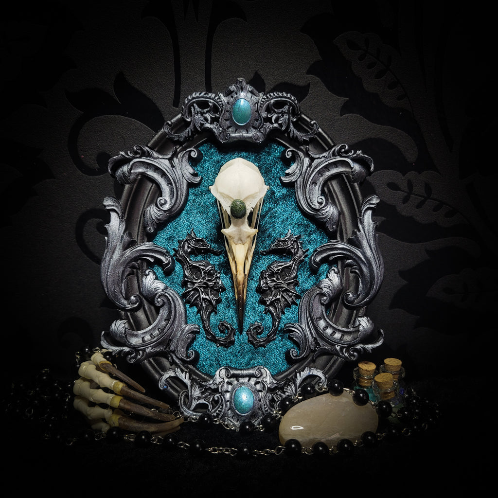 Song of the Sirens | Witches — handmade gothic wall decor with real bird skull, moss agate, sculpted seahorses with skull details on crushed blue-green velvet in hand-cast ornamental frame, 19x15cm