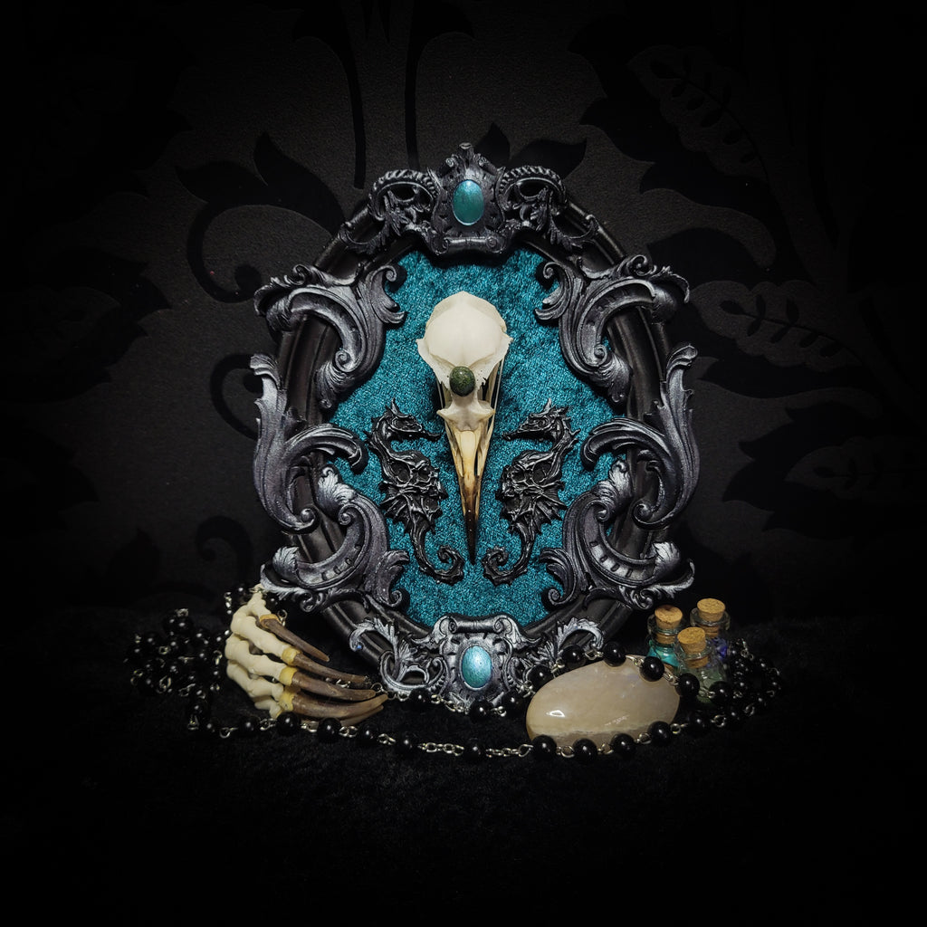 Song of the Sirens | Witches — handmade gothic wall decor with real bird skull, moss agate, sculpted seahorses with skull details on crushed blue-green velvet in hand-cast ornamental frame, 19x15cm