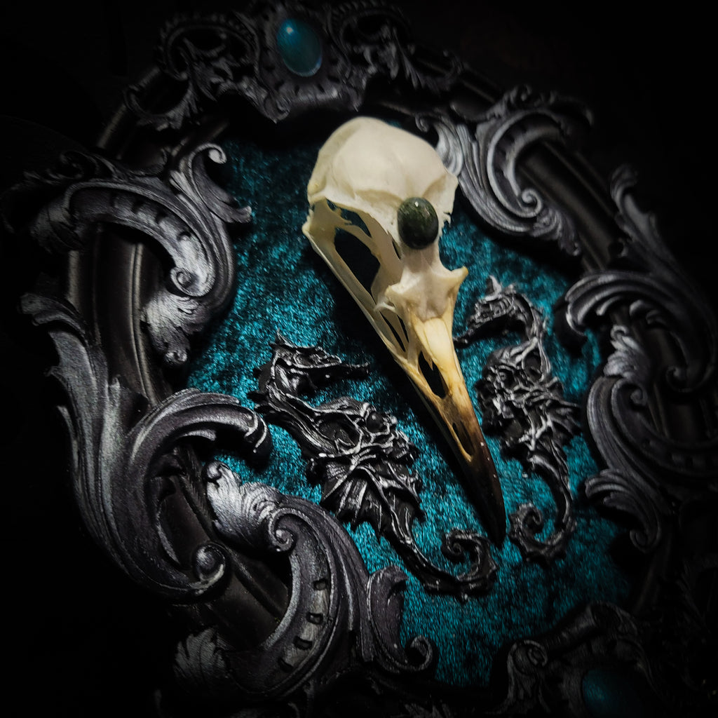 Song of the Sirens | Witches — handmade gothic wall decor with real bird skull, moss agate, sculpted seahorses with skull details on crushed blue-green velvet in hand-cast ornamental frame, 19x15cm