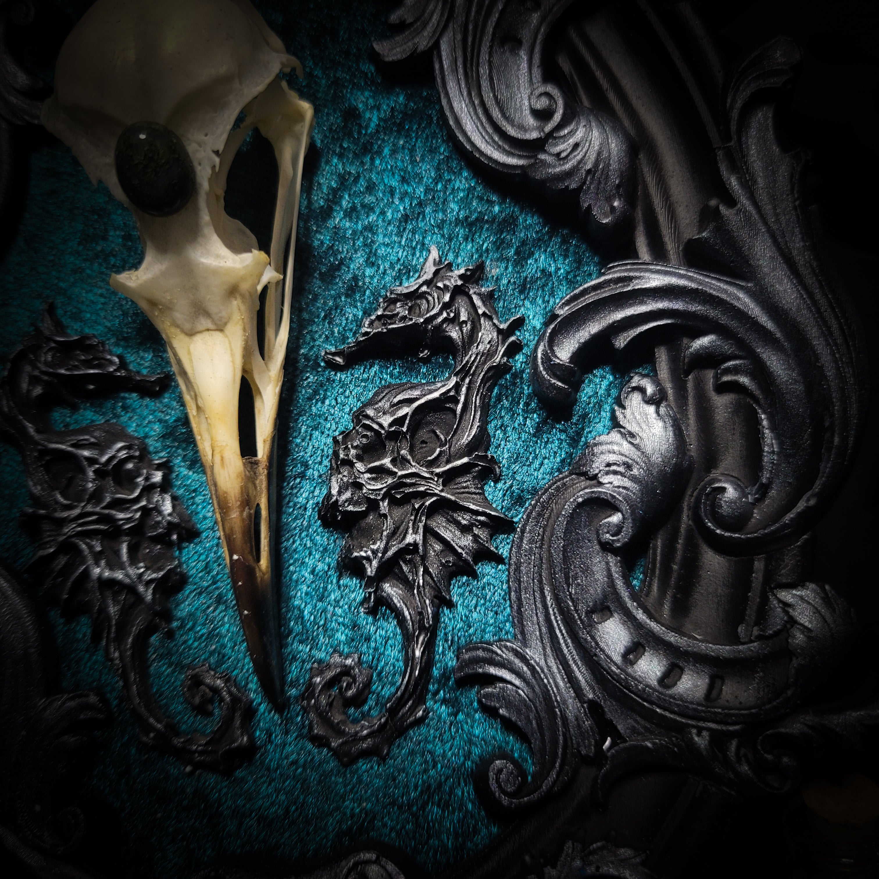 Song of the Sirens | Witches — handmade gothic wall decor with real bird skull, moss agate, sculpted seahorses with skull details on crushed blue-green velvet in hand-cast ornamental frame, 19x15cm