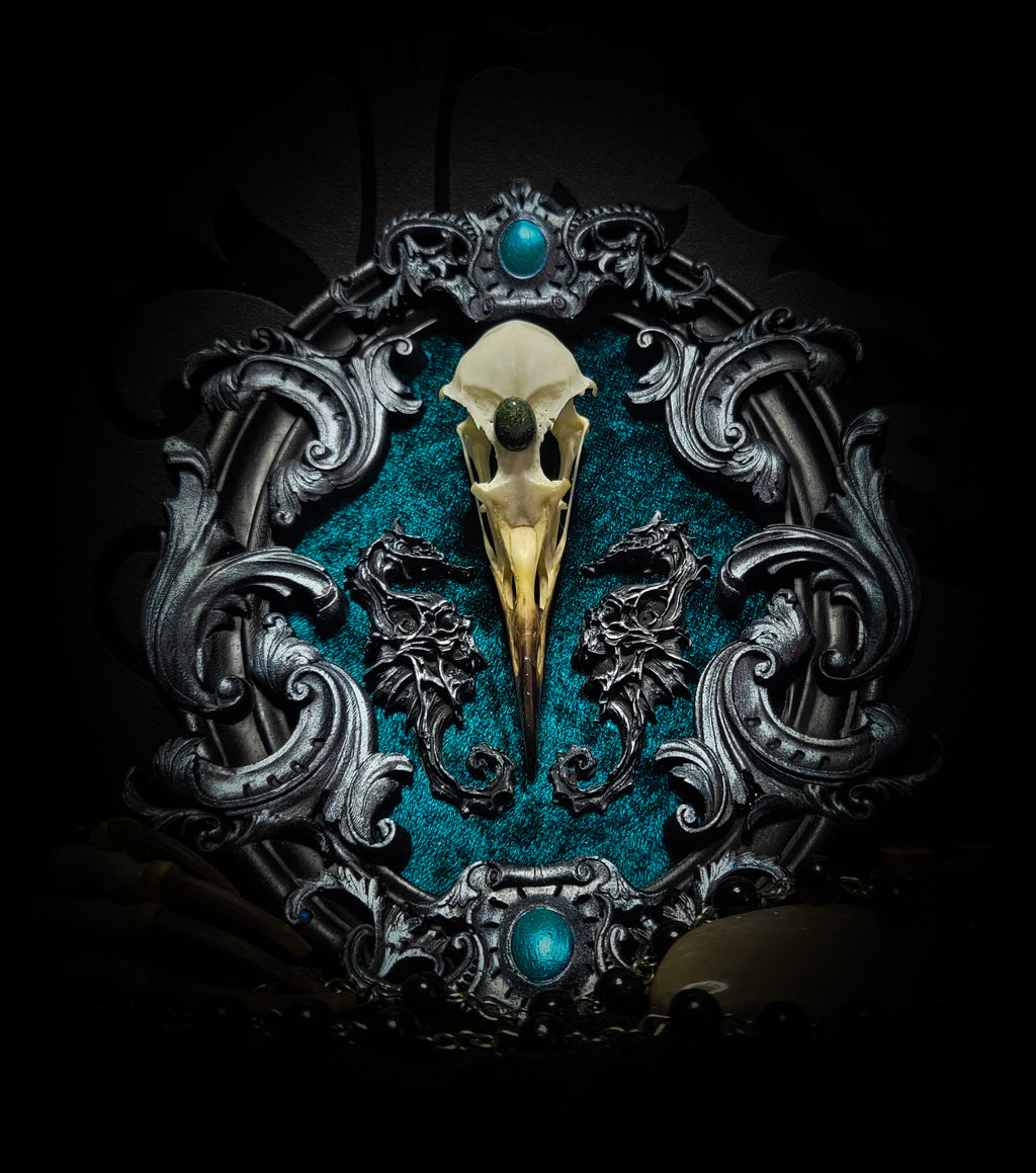 Song of the Sirens | Witches — handmade gothic wall decor with real bird skull, moss agate, sculpted seahorses with skull details on crushed blue-green velvet in hand-cast ornamental frame, 19x15cm