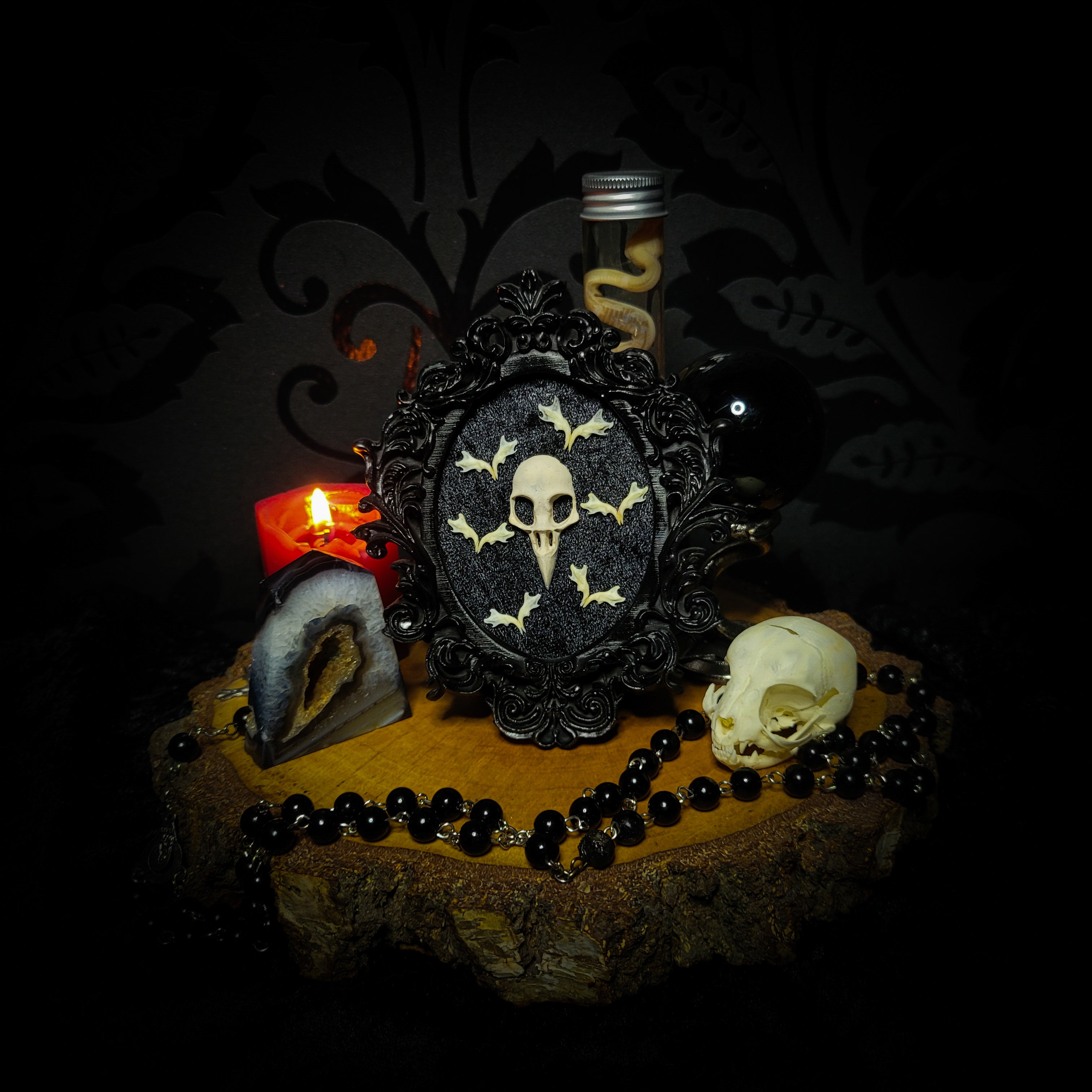 Halloween | Small Relics — handmade gothic wall frame with hand-cast crow skull, mouse jaws arranged in bat formation on black velvet textured background in hand-painted gothic frame, 12.5x10.5cm