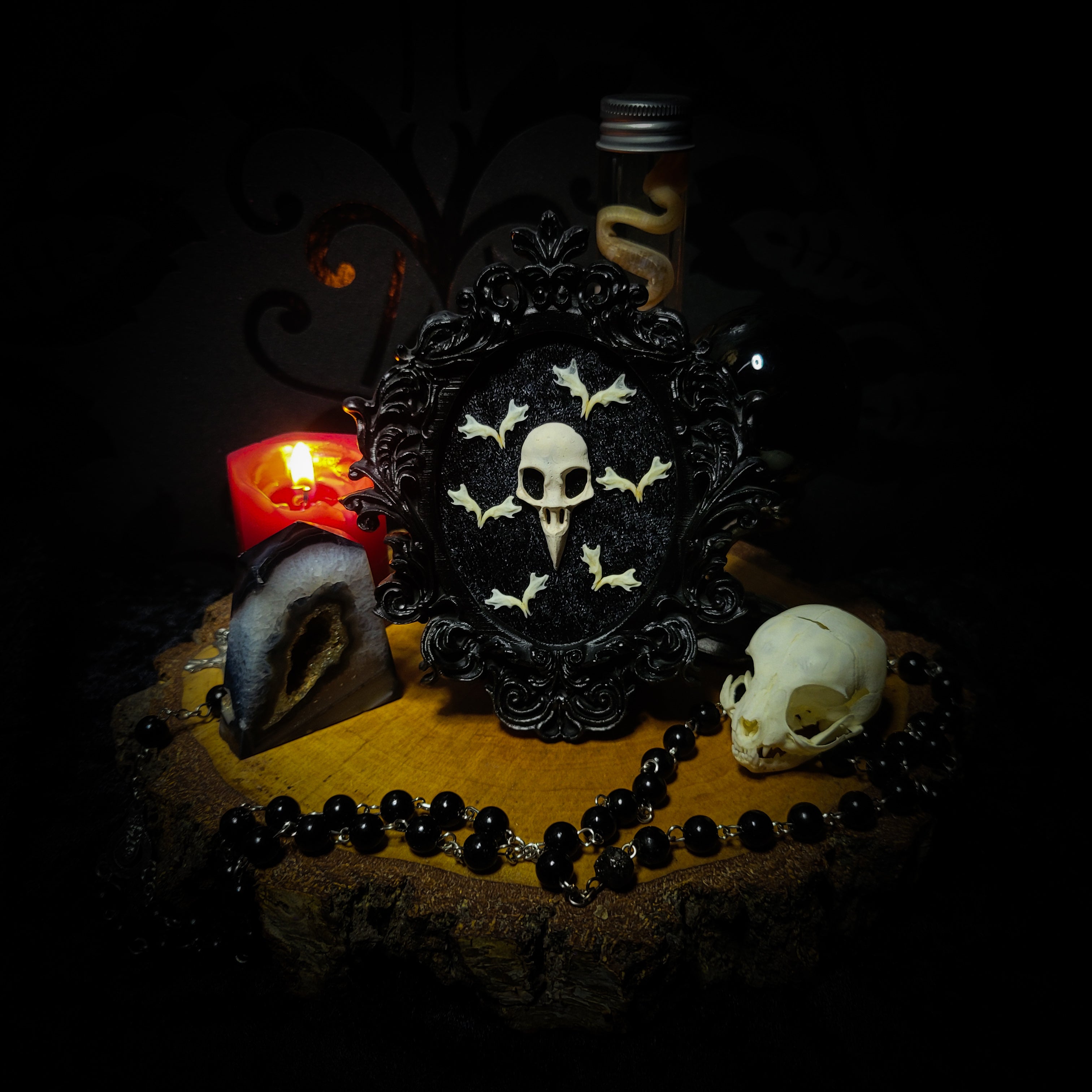 Halloween | Small Relics — handmade gothic wall frame with hand-cast crow skull, mouse jaws arranged in bat formation on black velvet textured background in hand-painted gothic frame, 12.5x10.5cm