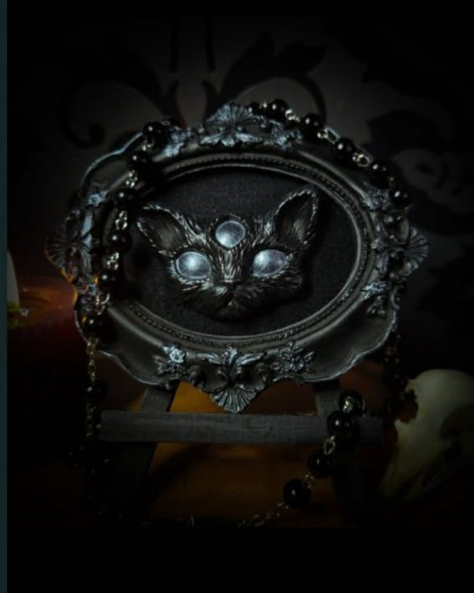 Oculus Arcani — handmade gothic shadowbox, made to order. Stylized cat head with third eye, hand-cast and hand-painted, set on velvet background in ornate baroque frame. Occult wall decor, 12x10cm.