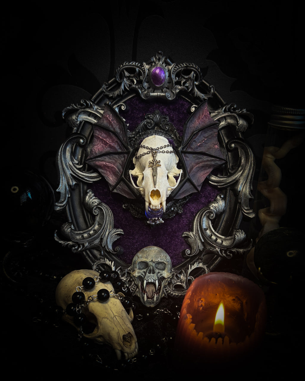 Handmade gothic wall decor with real mink skull, hand-cast bat wings, purple velvet and silver frame — Sepharius by Morbid Oddities