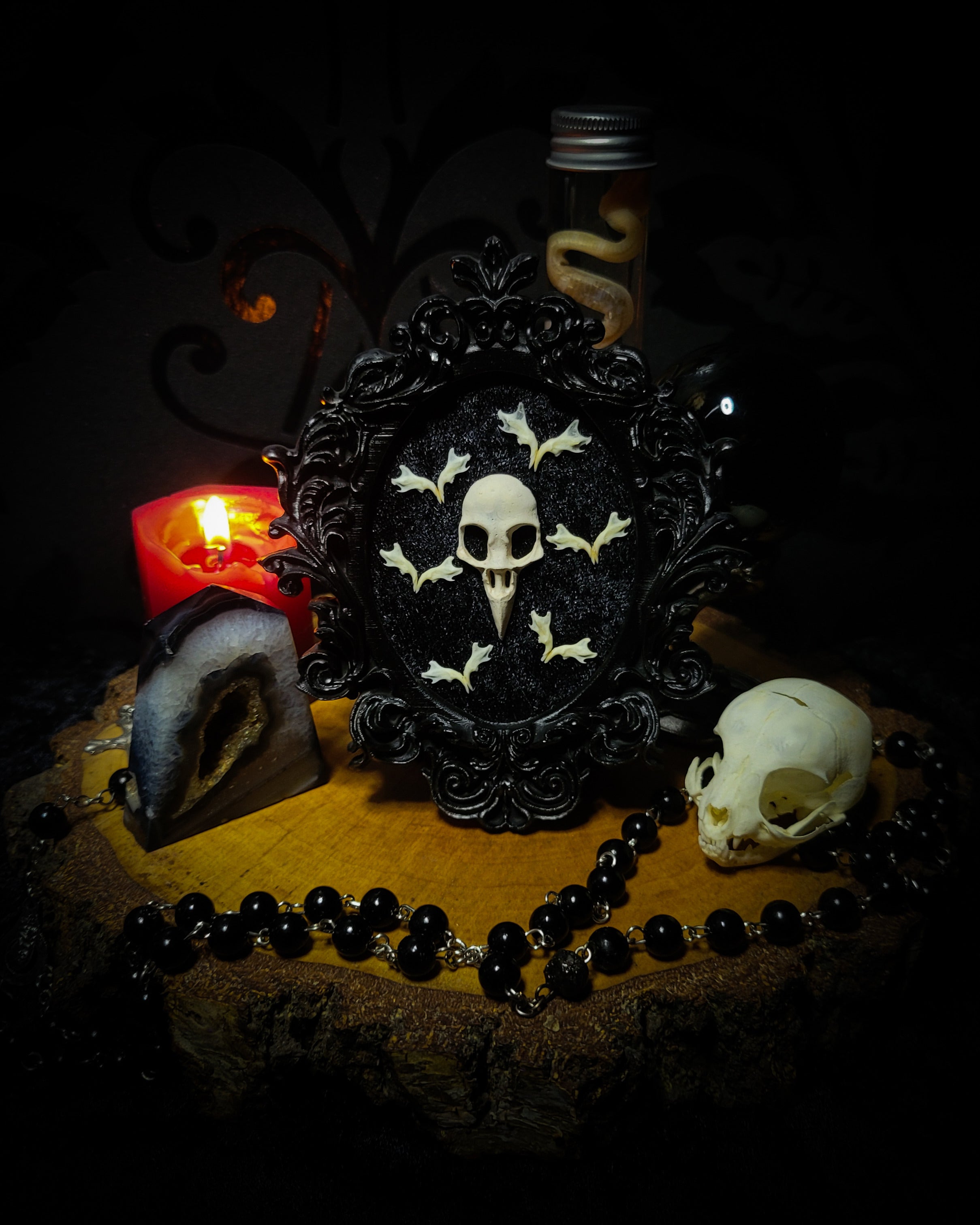 Halloween | Small Relics — handmade gothic wall frame with hand-cast crow skull, mouse jaws arranged in bat formation on black velvet textured background in hand-painted gothic frame, 12.5x10.5cm