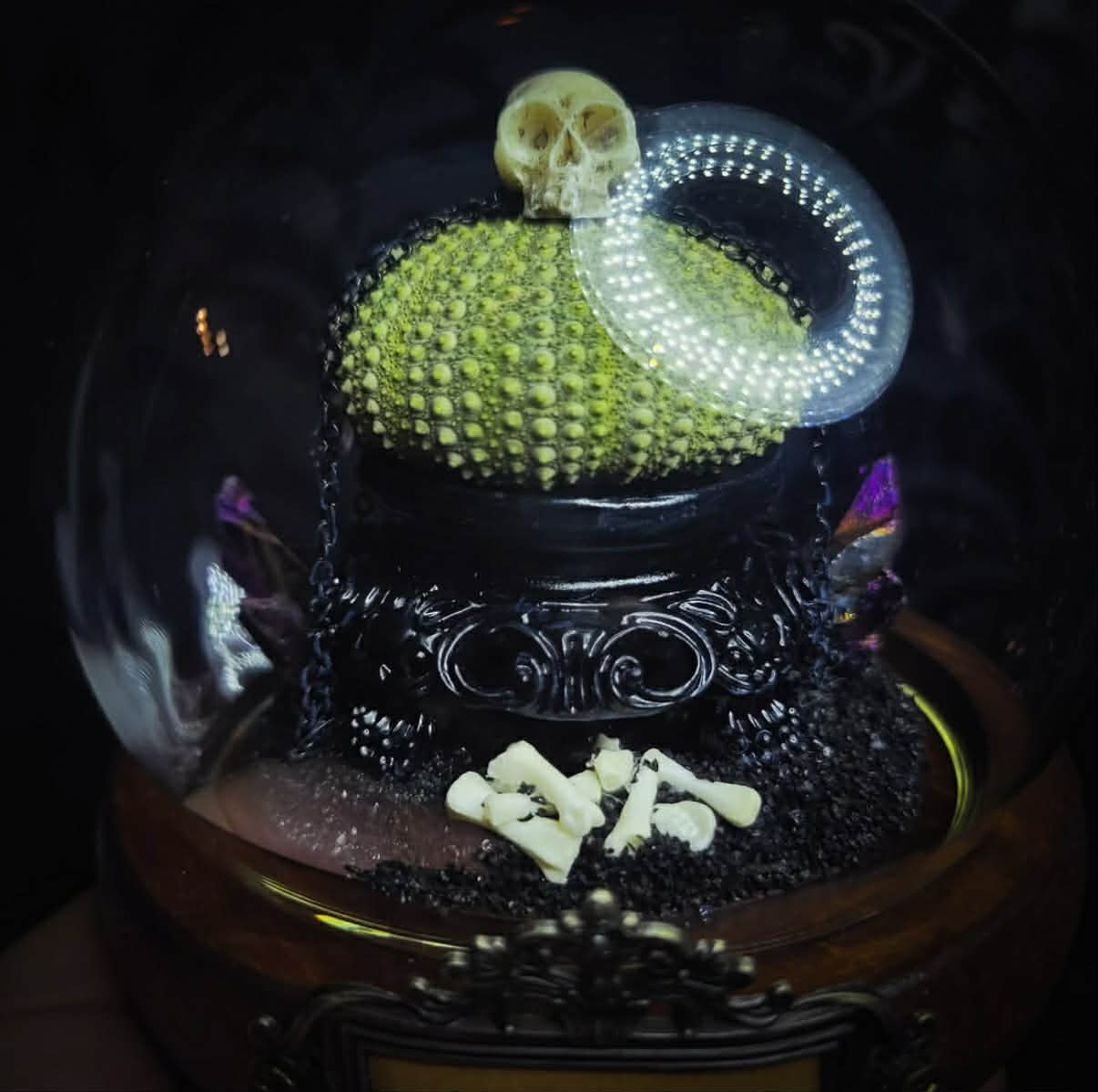 Siggurat | Occult — handmade gothic altar piece with ziggurat-inspired centerpiece, real bone elements, sea urchin skeleton, decorative crystals and chains under glass dome on hand-painted wooden base, 10x10cm
