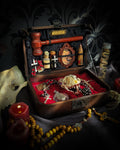 Vampire Hunter Kit — handmade gothic relic box, made to order. Hand-painted ornamented wooden suitcase with vampire stake, hammer, holy water, rosaries, crucifix, glass vials, miniature Bible and crimson velvet lining. Dark collectible decor, 23x17x9.5cm.
