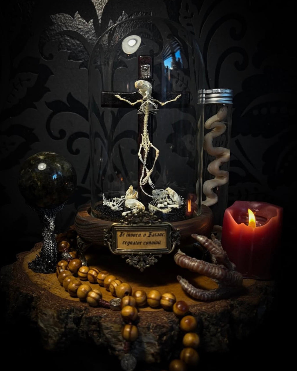 Crucifixa — handmade gothic glass dome display, made to order. Real mouse skeleton mounted on a cross under glass cloche on wooden base with occult elements, decorative bones and skeletal details. Dark ritual shrine decor.