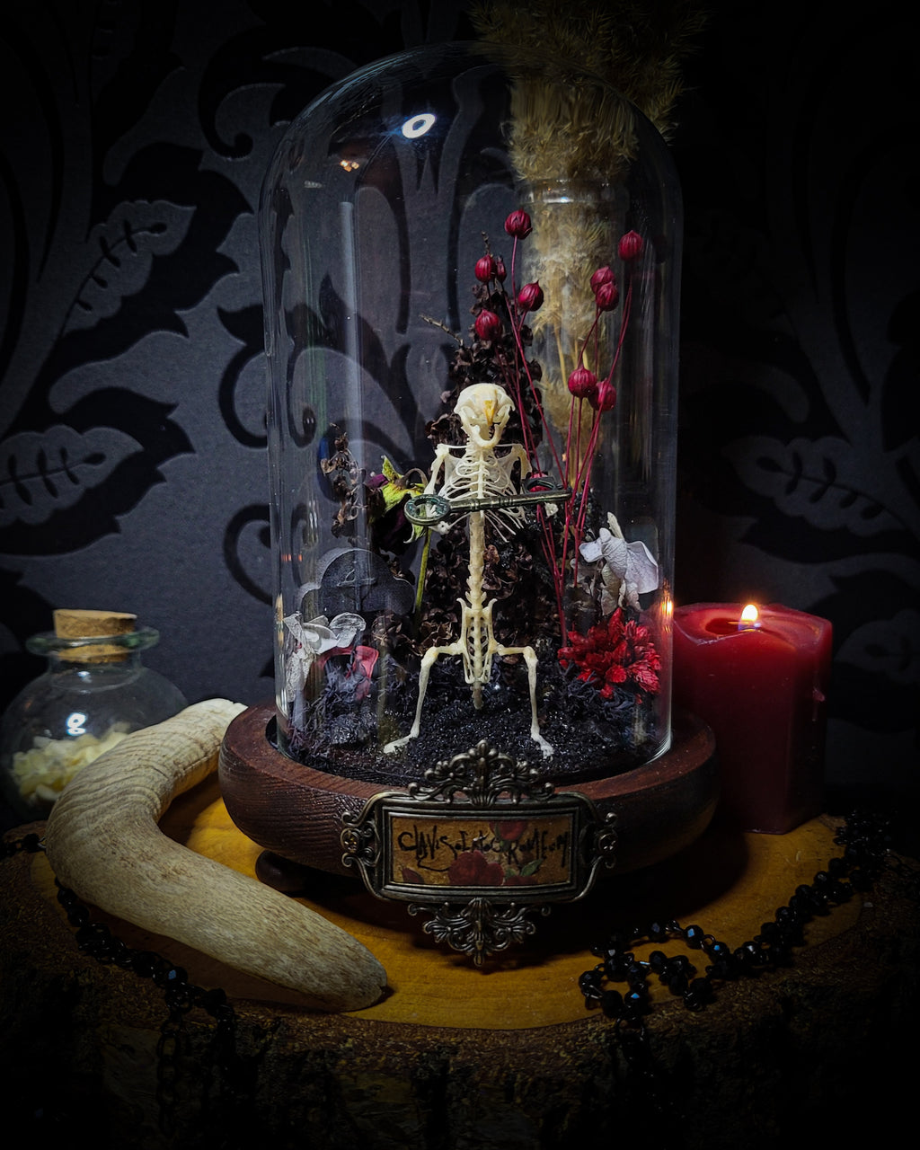 Key-keeper | Gothic — handmade gothic display with real mouse skeleton, ornamented key, miniature tombstone, preserved florals and Latin inscription plaque under glass dome on hand-painted wooden base, 17.5x11cm