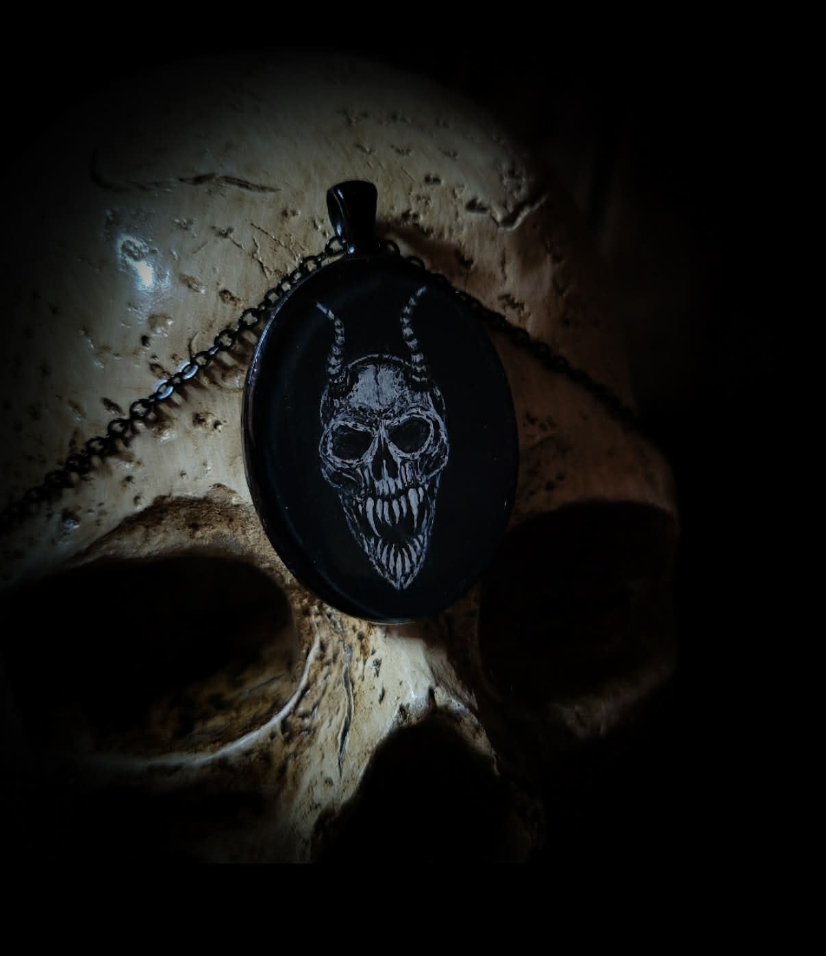Handmade gothic necklace — hand-painted horned skull, oval resin pendant with metal frame and chain
