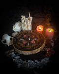 Wooden Pendulum Board — handmade divination pendulum board, made to order. Natural wood slice with hand-burned pyrography design, resin roses, crystals and ornamented legs. Custom witchcraft tool and altar decor by Morbid Oddities.