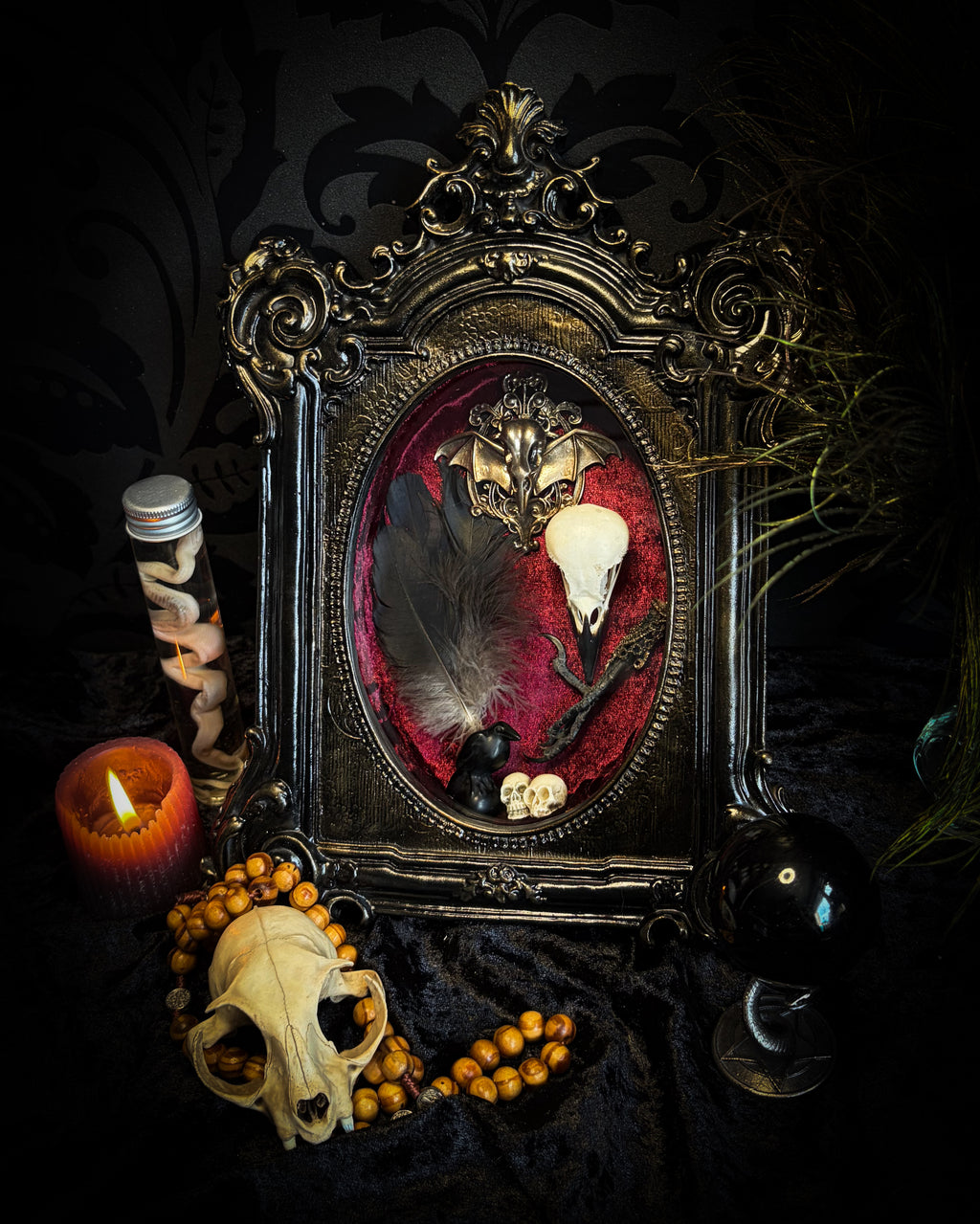 Corvus Rex | handmade gothic shadowbox with real crow skull, raven feathers, obsidian crow figurine, miniature skulls, crow foot, hand-cast painted baroque frame, hand-cut glass and burgundy velvet | Morbid Oddities

