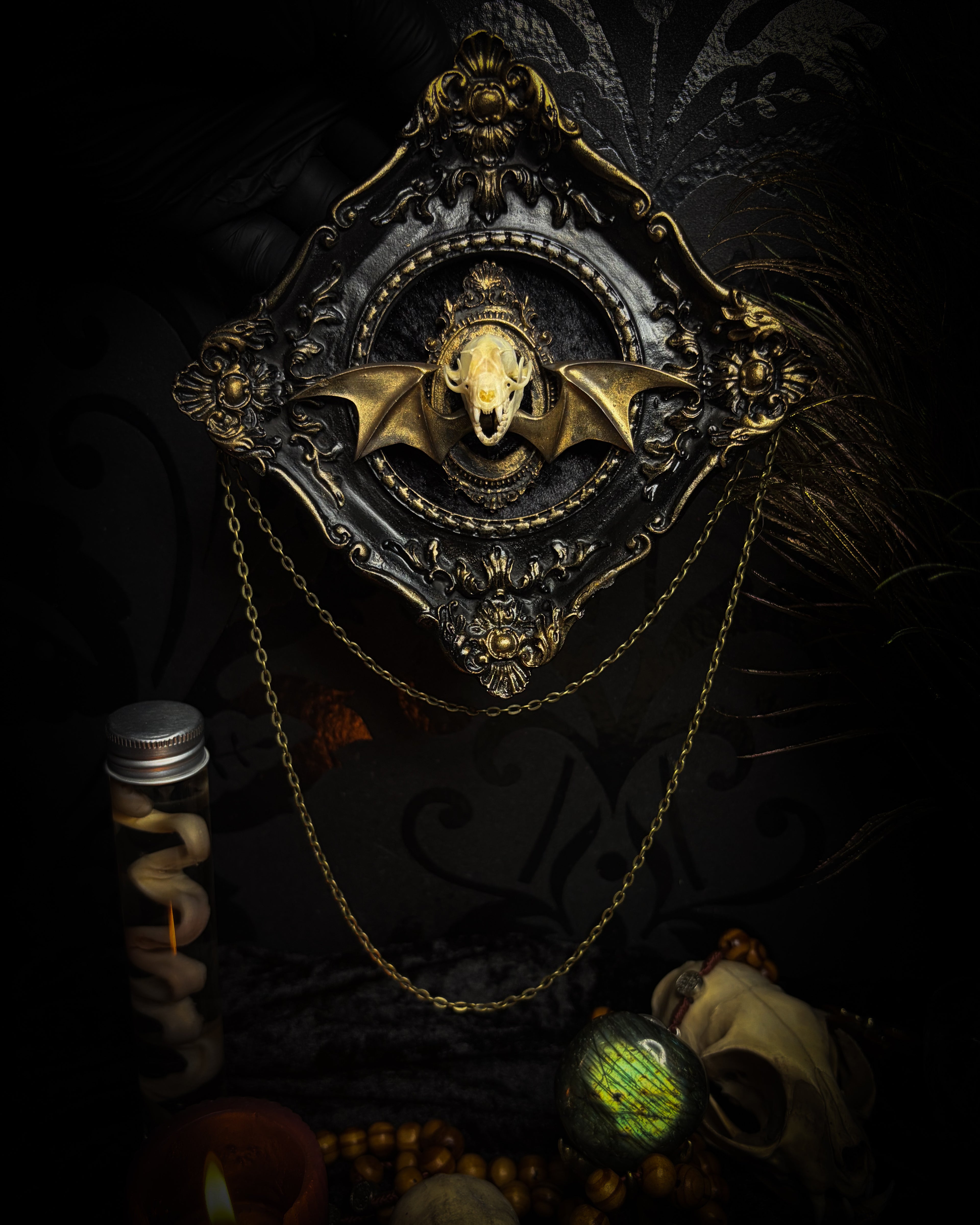 The Night Sovereign | handmade gothic relic with hand-cast painted bat skull, gold wings, gold chain and black velvet on ornate black frame | Morbid Oddities
