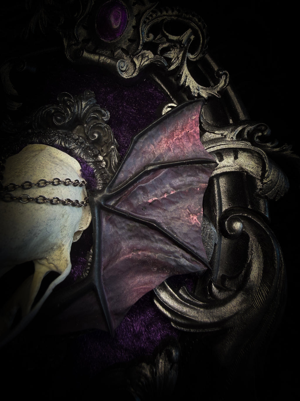 Handmade gothic wall decor with real mink skull, hand-cast bat wings, purple velvet and silver frame — Sepharius by Morbid Oddities