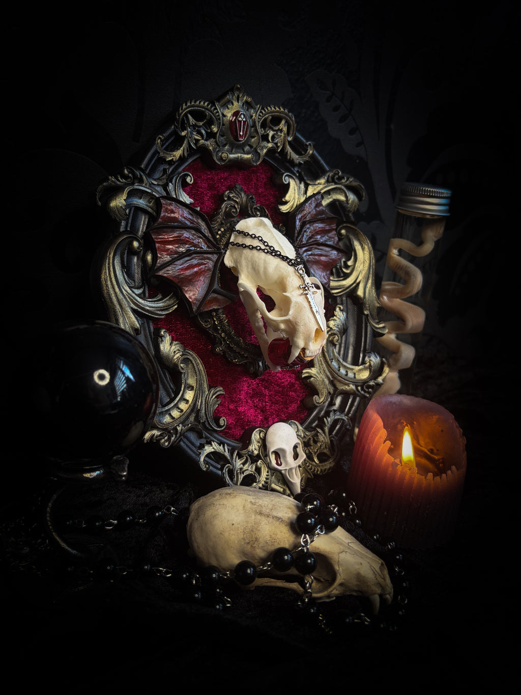 Handmade gothic wall decor with real mink skull, hand-cast bat wings, red velvet and gold frame — Malachar by Morbid Oddities