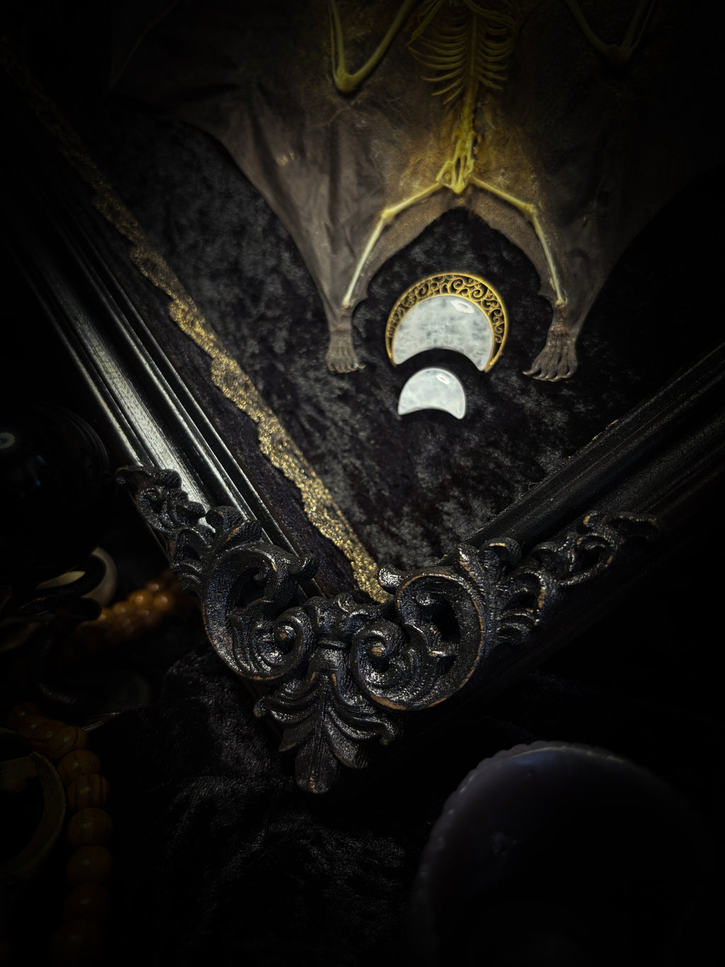Moonlit Bat | Shadowbox — massive handmade black wooden shadowbox with a half-mummified, half-skeletal bat, three quartz moons, black velvet and gold lace.