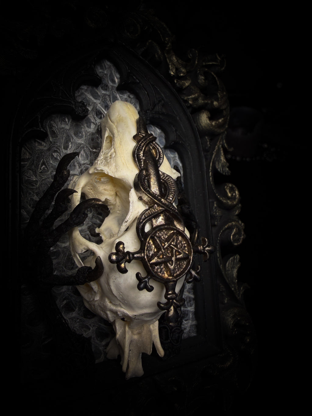 Unholy Hare — one-of-a-kind handmade gothic tracery frame with a real rabbit skull on snake skin, painted dove feet with gilded claws, a gold cross with pentagram and serpent, and a ring of marten fur
