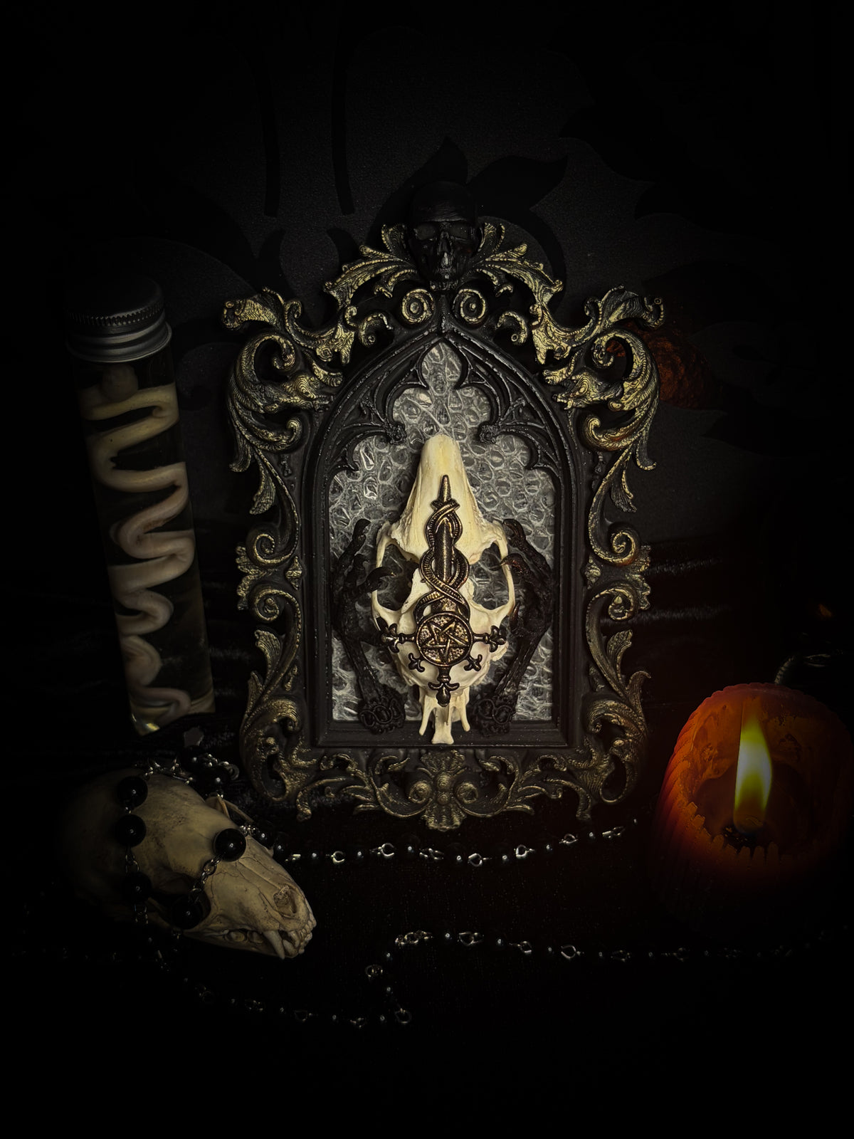 Unholy Hare — one-of-a-kind handmade gothic tracery frame with a real rabbit skull on snake skin, painted dove feet with gilded claws, a gold cross with pentagram and serpent, and a ring of marten fur
