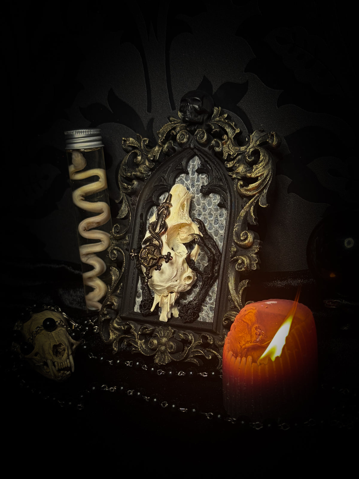 Unholy Hare — one-of-a-kind handmade gothic tracery frame with a real rabbit skull on snake skin, painted dove feet with gilded claws, a gold cross with pentagram and serpent, and a ring of marten fur
