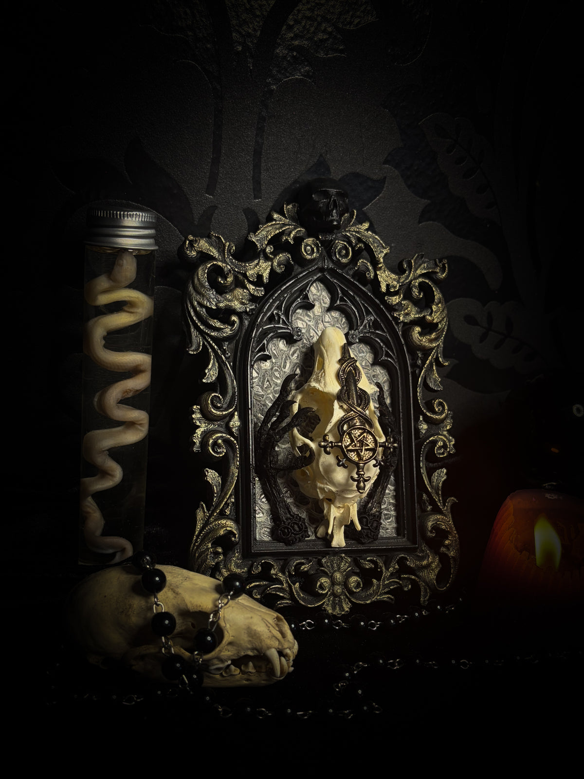 Unholy Hare — one-of-a-kind handmade gothic tracery frame with a real rabbit skull on snake skin, painted dove feet with gilded claws, a gold cross with pentagram and serpent, and a ring of marten fur
