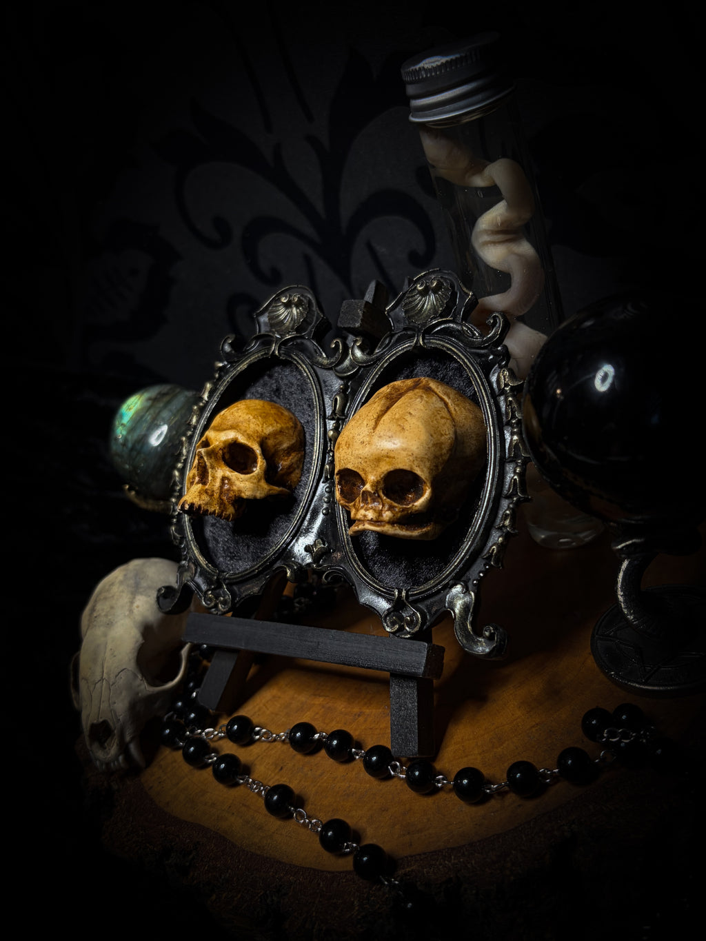 Kindred Remains by Morbid Oddities, a handmade gothic double frame with cast skulls on velvet, available with newborn skulls, adult skulls or a mixed pair