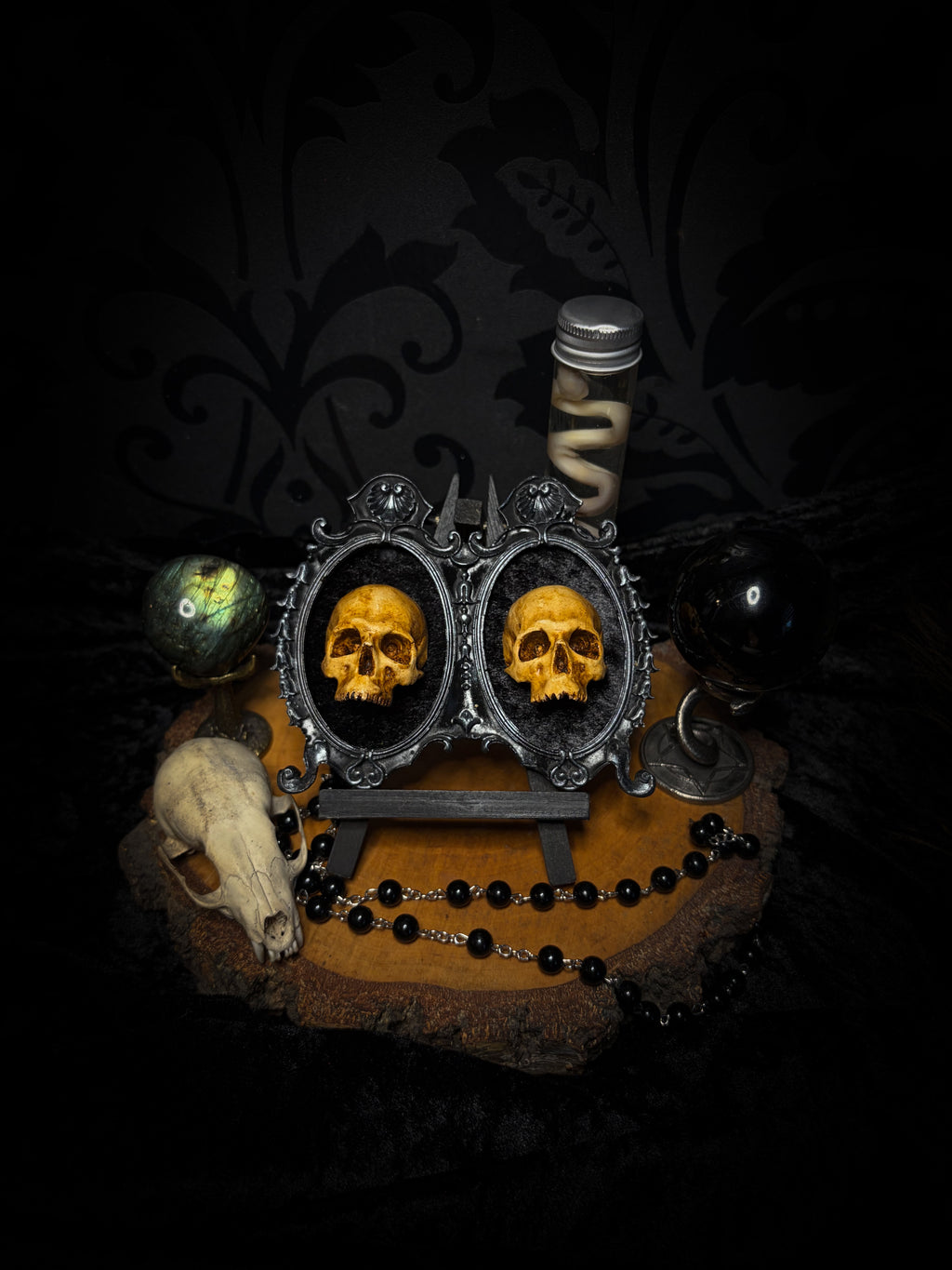 Kindred Remains by Morbid Oddities, a handmade gothic double frame with cast skulls on velvet, available with newborn skulls, adult skulls or a mixed pair