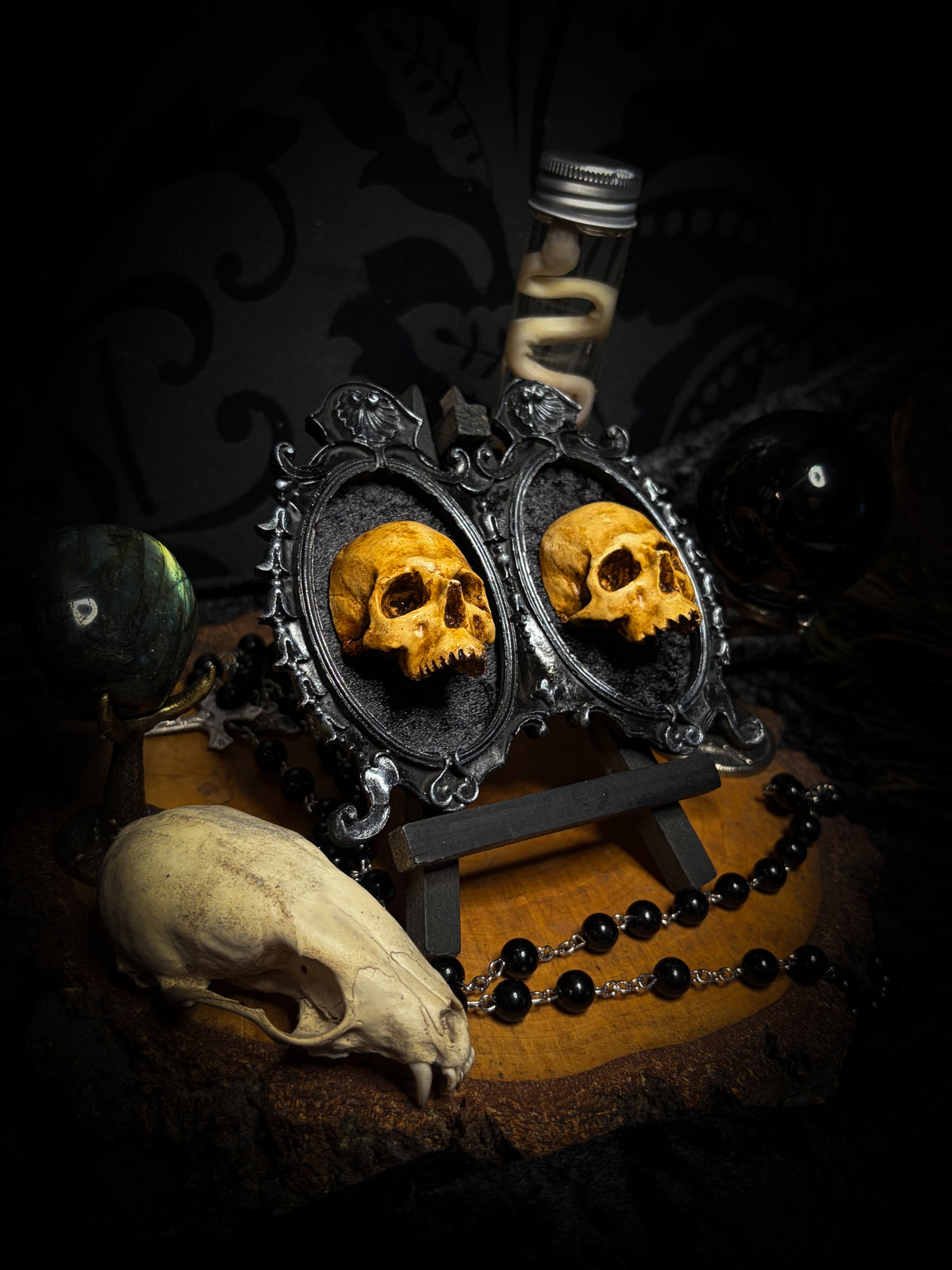 Kindred Remains by Morbid Oddities, a handmade gothic double frame with cast skulls on velvet, available with newborn skulls, adult skulls or a mixed pair
