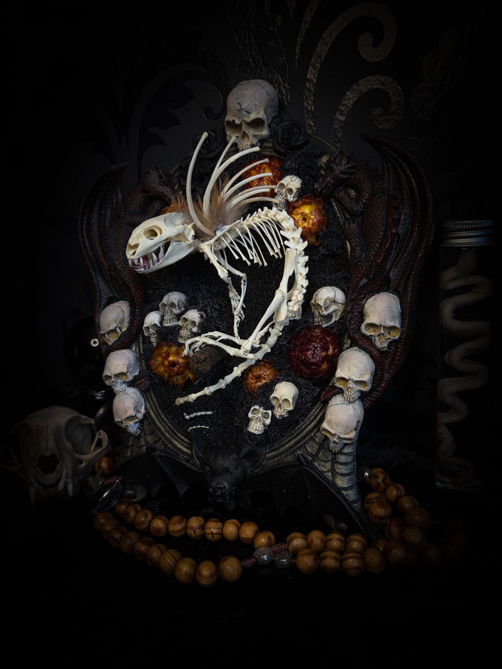 Handmade gothic wall decor — hand-assembled real bone dragon skeleton with turtle skull, hand-cast gothic frame with dragons and skull motifs, 25x20cm