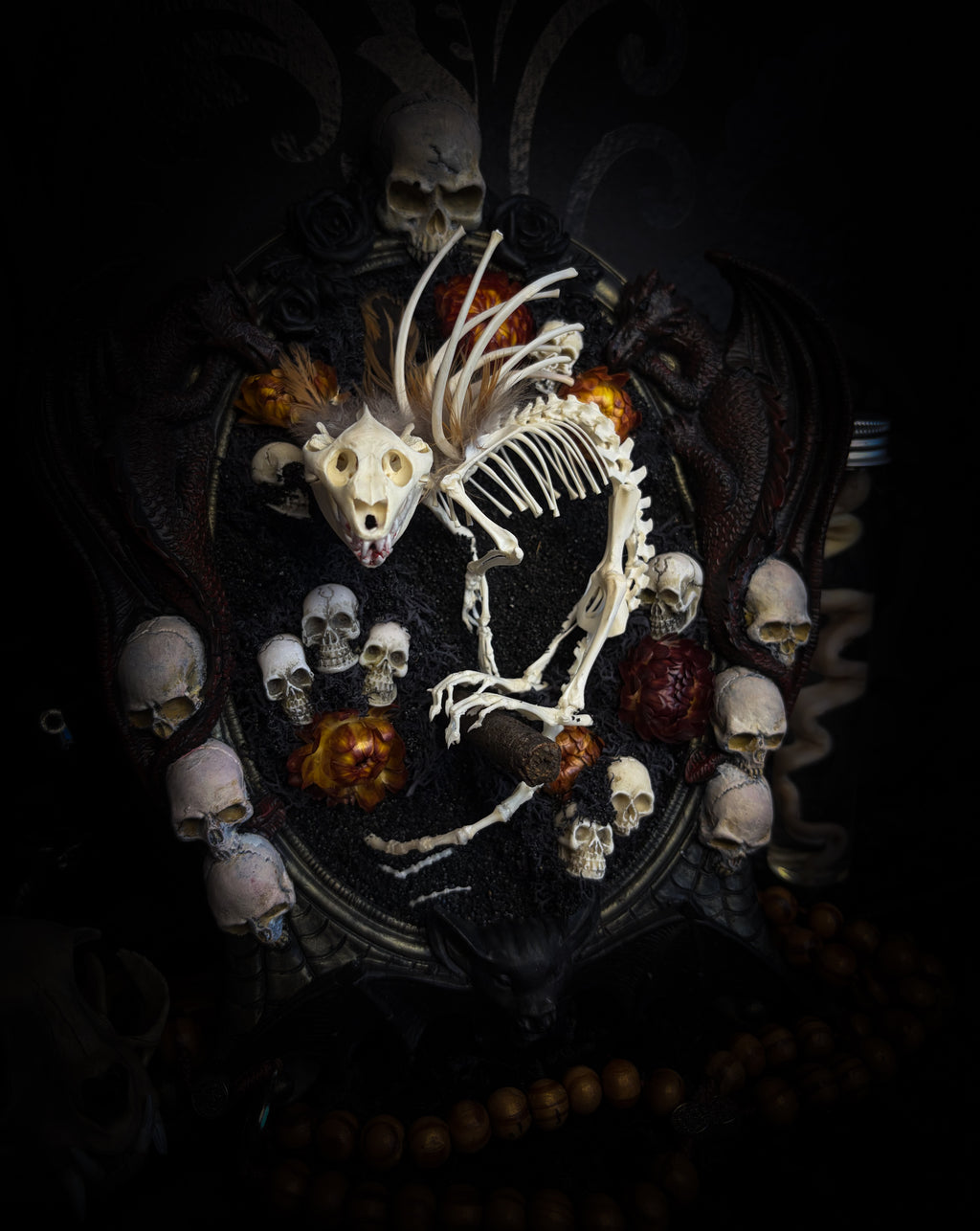 Handmade gothic wall decor — hand-assembled real bone dragon skeleton with turtle skull, hand-cast gothic frame with dragons and skull motifs, 25x20cm