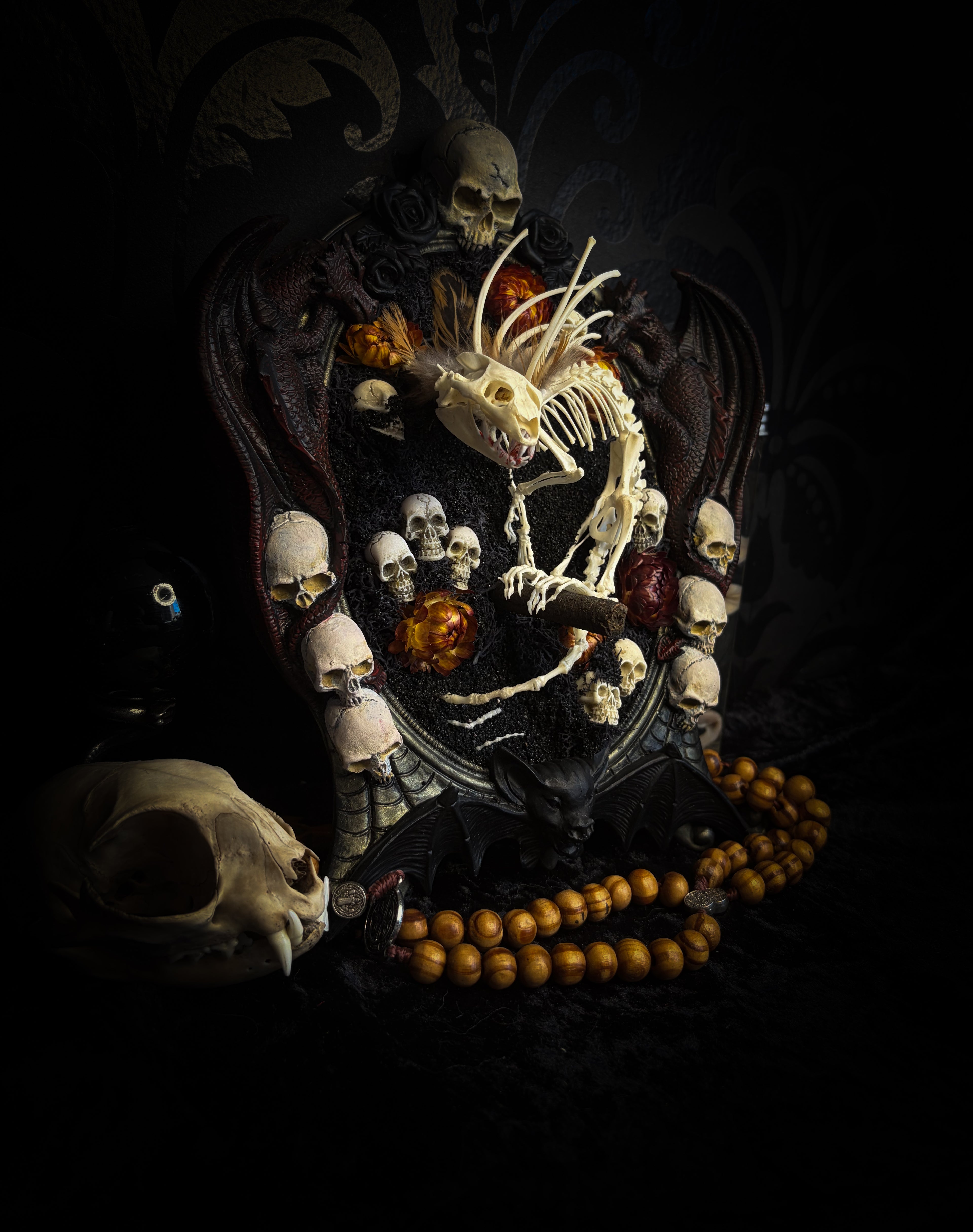 Handmade gothic wall decor — hand-assembled real bone dragon skeleton with turtle skull, hand-cast gothic frame with dragons and skull motifs, 25x20cm