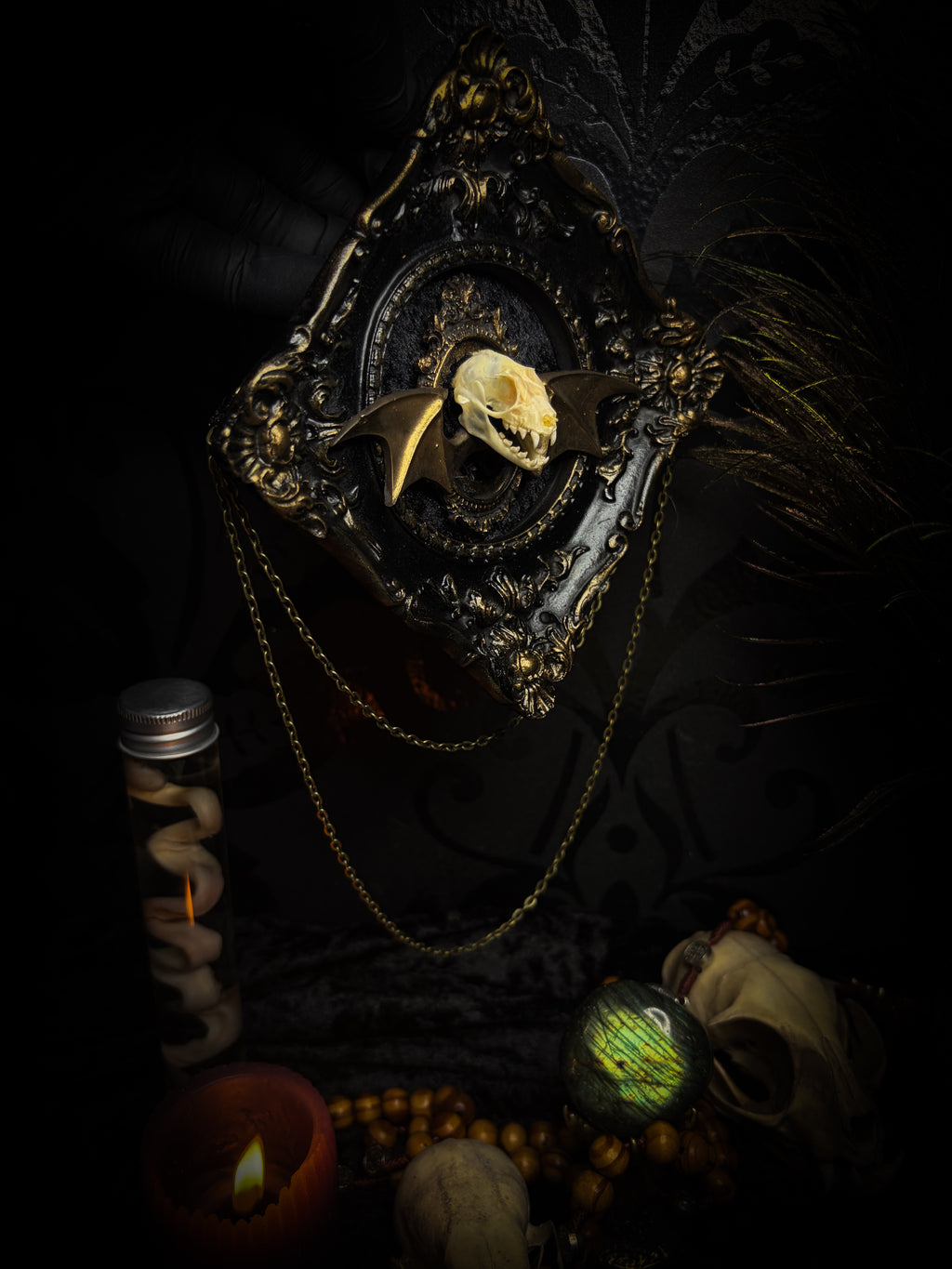 The Night Sovereign | handmade gothic relic with hand-cast painted bat skull, gold wings, gold chain and black velvet on ornate black frame | Morbid Oddities
