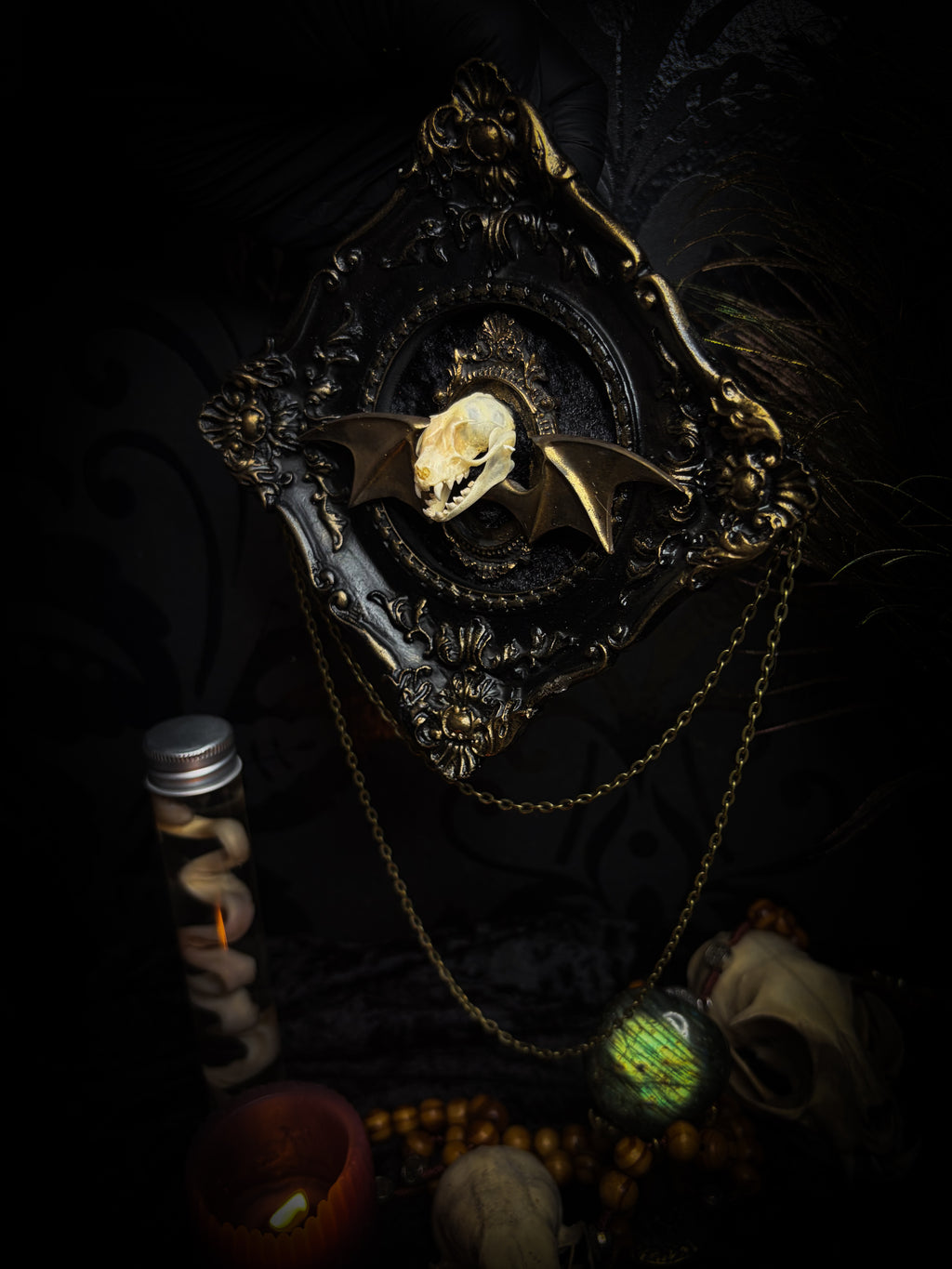 The Night Sovereign | handmade gothic relic with hand-cast painted bat skull, gold wings, gold chain and black velvet on ornate black frame | Morbid Oddities
