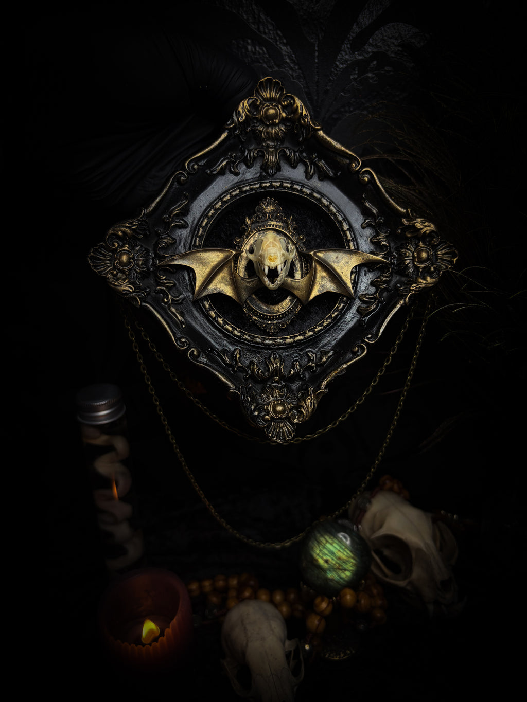 The Night Sovereign | handmade gothic relic with hand-cast painted bat skull, gold wings, gold chain and black velvet on ornate black frame | Morbid Oddities
