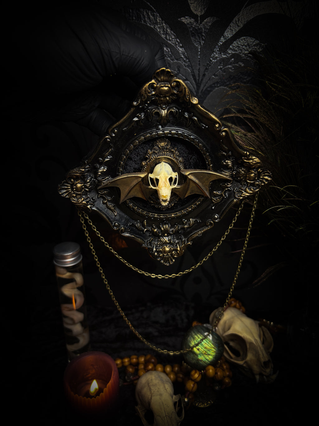 The Night Sovereign | handmade gothic relic with hand-cast painted bat skull, gold wings, gold chain and black velvet on ornate black frame | Morbid Oddities
