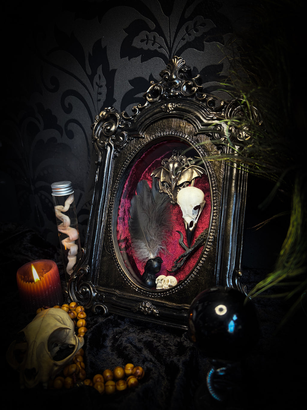 Corvus Rex | handmade gothic shadowbox with real crow skull, raven feathers, obsidian crow figurine, miniature skulls, crow foot, hand-cast painted baroque frame, hand-cut glass and burgundy velvet | Morbid Oddities
